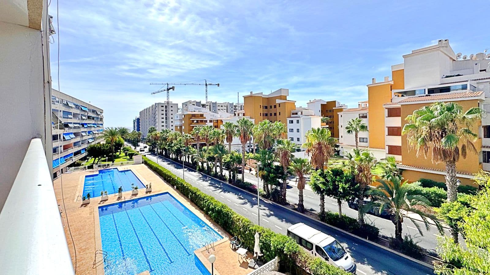This cozy 4th-floor apartment with 1 bedroom and 1 bathroom is in its original condition but well maintained, ready to move into and enjoy. With a built area of approximately 50 m², it offers a bright atmosphere thanks to its orientation and its terrace with side sea views.The living-dining room is spacious and functional, with direct access to the terrace, an ideal place to relax outdoors while enjoying the Mediterranean breeze. The independent kitchen keeps its original design, well distributed and connected to the living area through a serving hatch, which adds comfort to daily life.The bedroom includes a built-in wardrobe and receives plenty of natural light, while the bathroom maintains its classic original style.Edificio Lyon, located in the sought-after area of Rocío del Mar, offers a community swimming pool and parking area, providing comfort and tranquility. The urbanization is surrounded by all necessary services: supermarkets, restaurants, public transport, and leisure facilities.Its location is excellent, just a few minutes’ walk from Rocío del Mar and Punta Prima beaches, making this apartment an ideal option as a permanent residence, holiday home, or rental investment.