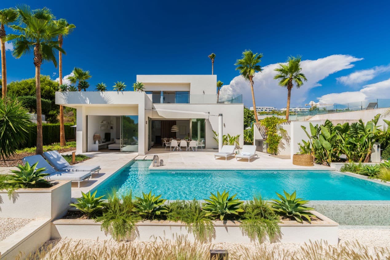 Firstline luxury villa with heated infinity pool in Las Colinas Golf, Dehesa de Campoamor, Orihuela Costa, Costa Blanca South 

Indulge in luxury living at this stunning villa, perfectly positioned overlooking the lush greens of a prestigious golf course within a secure, gated community. Boasting 5 bedrooms and 3 bathrooms, each adorned with their own charming private terraces, this south-facing sanctuary ensures unparalleled comfort and privacy.

Safeguard your vehicles in style with a private parking area for two cars, accessible via a remote-controlled gate. Ascend to the first floor to discover the exquisite master suite, featuring a spacious terrace and opulent ensuite bathroom with panoramic views of the picturesque golf course.

The heart of this residence is its expansive living area, seamlessly blending an open-plan kitchen and dining space, illuminated by ample natural light cascading through large sliding windows. Step outside onto the sun-drenched terrace, complete with a fully equipped kitchen featuring a Green Egg BBQ, fridge, and ample room for a golf buggy, all enveloped in serene seclusion.

Delight in endless relaxation with the infinity pool, heated to perfection by a state-of-the-art heat pump. Discover the hidden storage area behind a discreet door in the fully equipped kitchen, featuring modern conveniences such as a microwave oven, coffee machine, and integrated wine cooler.

Unwind in the cozy living area, enhanced by an ambient gas fireplace with remote control. As evening falls, immerse yourself in the enchanting ambiance of the lush landscaped garden, illuminated by tasteful lighting and equipped with an automatic irrigation system.

Spanning 970m2 of meticulously manicured grounds, this villa offers 241.22m2 of refined living space. With a yearly Suma of 780 euros and pending community fees, the comprehensive price of 2,150,000 euros includes all interior and exterior furnishings, ensuring a seamless transition to your dream lifestyle. 

Experience unparalleled luxury at every turn in this frontline villa retreat.

Extra's:

Domotic systemHeated infinity poolCoffee machine and wine cooler integrated in the kitchenAir Conditioning Fully equipped outdoor kitchen including green egg BBQ and fridge Open fireplace on gas with remote controlSonos music systemLandscaped garden with irrigation system and lights