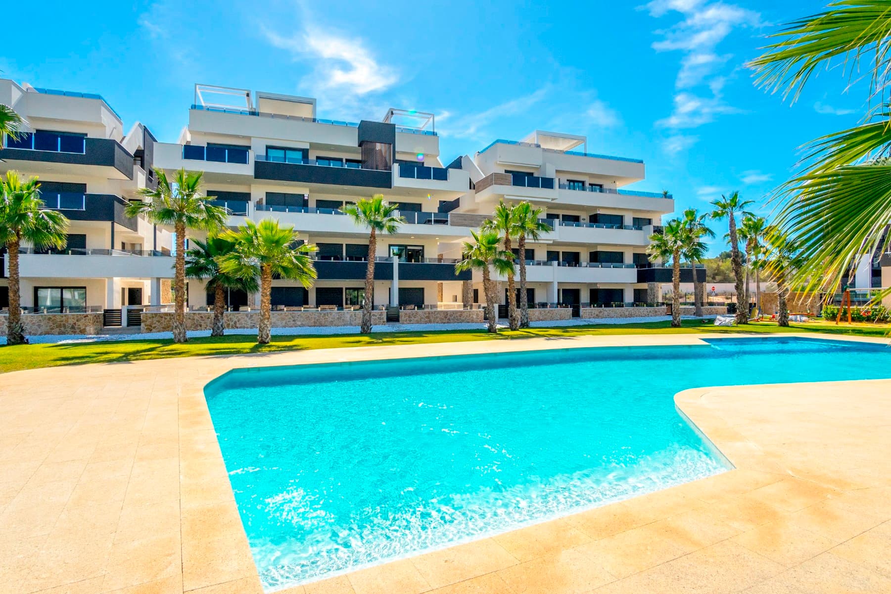 Stunning corner apartment in Los Altos, Orihuela Costa, Alicante, Costa Blanca.

This brand-new corner apartment on the first floor was completed in April 2024 and has never been occupied! 

With a south-west facing terrace, it’s perfect for enjoying midday and afternoon sunshine, offering lovely views of the pool and communal area adorned with palm trees. The apartment spans 75m² with nearly 24m² of terrace space and is being sold fully furnished, including white goods. Additionally, it features a private underground parking space and a storage unit.

Ready for immediate occupancy, the apartment can be handed over within a month, making it an excellent choice for a vacation home or a solid investment.

The communal facilities include a generously sized swimming pool, a children's playground, a fitness area, as well as a sauna and jacuzzi for residents. Conveniently located near shops, restaurants, and Torrevieja Hospital, it’s just a 15-minute drive to the beach and 40 minutes to Alicante Airport.