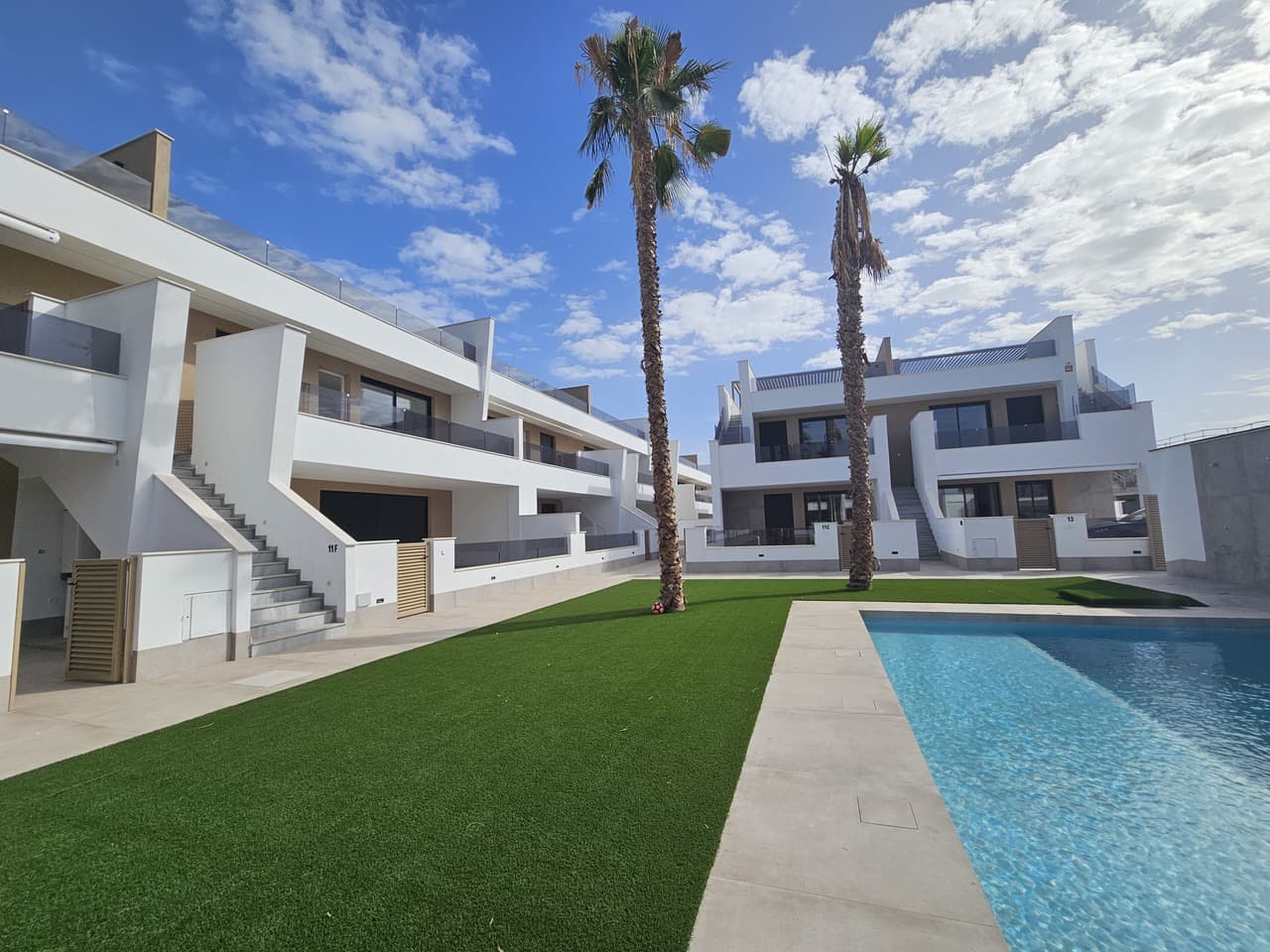 BUY THIS RESALE DIRECT from the owner this brand new Penthouse apartment located just a 3 minute walk from the heart of San Pedro del Pinatar and a few minutes drive from both the Mediterranean sea and the Mar Menor. The top floor apartment boasts views across the stunning swimming pool on a private corner plot. The apartment has a very large living and dining room with floor to ceiling patio doors providing lots of natural light and access to the private terrace area. There is a spectacular fully fitted kitchen with feature 'island' and brand new kitchen appliances. The master bedroom has a stylish en-suite bathroom and there are an additional two guest bedrooms with fitted wardrobes and a slick family bathroom with walk-in shower. The apartment also has a terrace to the rear of the property with an external staircase leading up to super impressive 77m2 solarium. This fantastic space boasts panoramic views across the swimming pool and has a equipped summer kitchen. You will also find the uitily room and storage cupboard. This property is sold with designated parking and a storage unit.
