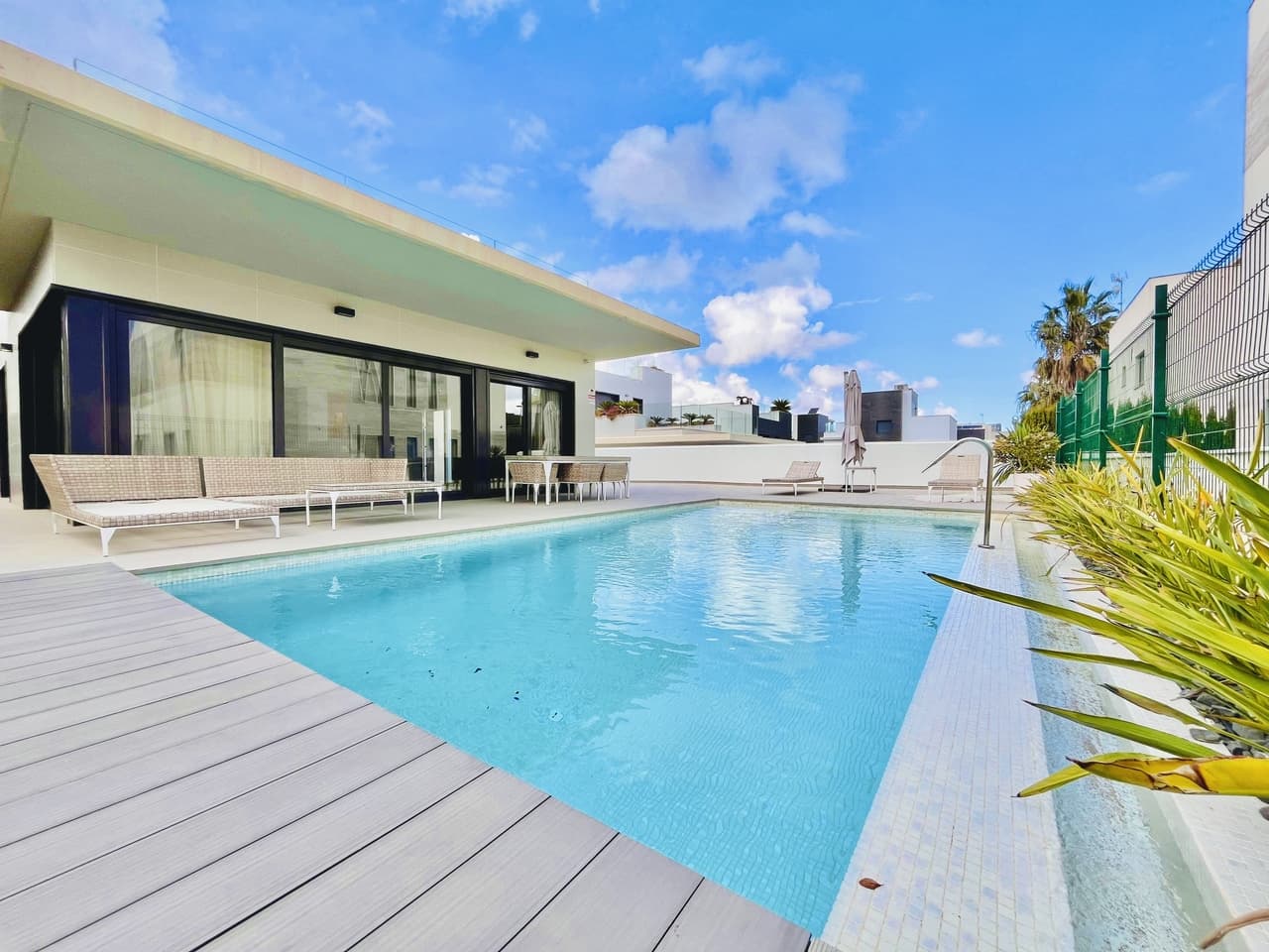 Discover this luxury detached villa in Dehesa de Campoamor, offering 4 spacious bedrooms and 3 stylish bathrooms. Designed with ultimate comfort and modern living in mind, this stunning home features electric blinds, expansive windows, and an open-plan kitchen that comes fully furnished. Every room is equipped with air conditioning to ensure year-round comfort. Additional highlights include a private swimming pool, two large terraces perfect for relaxation or entertaining, en-suite bathrooms, and secure parking for two vehicles.Situated in a tranquil and secure residential area, this villa boasts a prime location just minutes away from Cabo Roig and the renowned Zenia Boulevard shopping center. A variety of bars and restaurants are within easy reach, providing endless dining options. A Consum supermarket and pharmacy are conveniently located at the residence's entrance. Best of all, the pristine beach is only 300 meters away, offering the perfect coastal escape.With its impeccable design, private pool, and sought-after location, this villa is the epitome of luxury living.