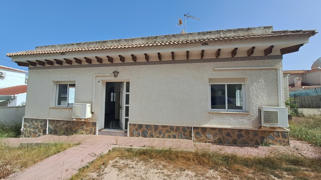 We present this villa located in Villamartin. When we enter into this property we can find a huge living room with fireplace. This living room is connected to the dinning room. And from there we go to a open kitchen with laundry room. There is a long corridor where we find four of the bedrooms with wardrobes, and two bathrooms whichs one of them has bathtub.Upstairs we find the fifth bedroom and a big solarium with sea views.This property is perfectly located as it has many bars, shops and supermarkets walking distance. And also has Campoamor and Ramblas Golf courses only 10 minutes walking.