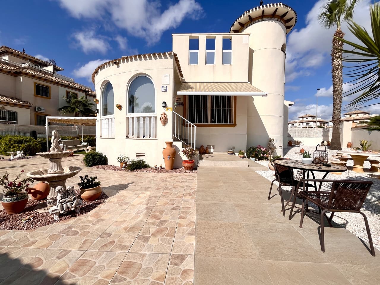 This unique sun-drenched coastal home offers 2 bedrooms, 2 bathrooms, and a private rooftop solarium with sea views, all set in the peaceful and highly desirable area of Lomas de Cabo Roig. Just a short walk from local restaurants, cafés, and essential services, and only a 15-minute stroll to the beaches of Cabo Roig, it’s the perfect blend of comfort and location.Situated on a 411 m² corner plot, the property includes private off-road parking and plenty of outdoor space with potential for a private swimming pool. You’ll also find a built-in BBQ area, outdoor kitchen, and a storage shed, perfect for entertaining or enjoying the outdoor Mediterranean lifestyle. The villa enjoys sun all day long, ideal for relaxing or entertaining. The spacious rooftop solarium provides elevated sea views and a private space to soak up the Spanish sun.Inside, the villa has been tastefully modernised with new built-in wardrobes, efficient hot and cold A/C units, and two fully renovated bathrooms finished to a high standard. Throughout the home, you’ll find premium laminate flooring for a sleek, cohesive look. Although currently arranged as a 2 bedroom villa, it offers the flexibility to easily convert back to 3 bedrooms by simply re-installing a partition walL, offering added value and adaptability.All windows and doors have been upgraded with tilt-and-turn systems, fly screens, and integrated blinds. To maintain the home’s low-maintenance appeal, galvanized and powder-coated security grilles have also been installed.