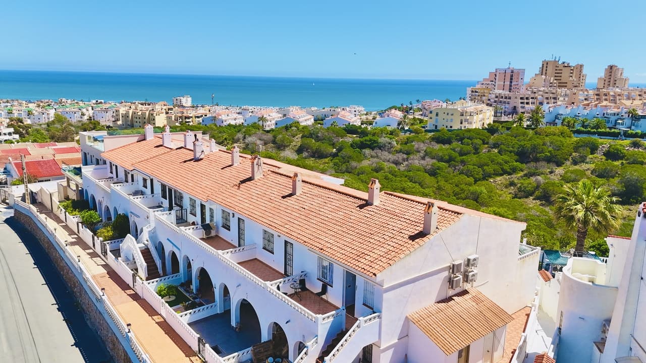 Discover your dream coastal escape with this charming 1-bedroom top floor bungalow, perfectly situated in the heart of La Mata, one of the most sought-after locations on the Costa Blanca. This property is a true gem, offering breathtaking sea views from both its south and north-facing terraces—perfect for soaking up the sun all day long or enjoying the cool Mediterranean breeze.Inside, you'll find a bright and airy open-plan living room and kitchen, designed for modern, social living. Whether you're entertaining guests or simply relaxing, this space flows beautifully and is filled with natural light.La Mata is famous for having the best beach on the Costa Blanca—a wide, golden stretch of sand that seems to go on forever. It’s the perfect place for a morning walk, a refreshing swim, or a relaxing day under the sun. The town itself offers every amenity you could wish for: supermarkets, restaurants, cafes, pharmacies, weekly markets, and excellent public transport—all within walking distance.Whether you're looking for a holiday home, a rental investment, or a year-round residence, this bungalow ticks all the boxes. Don’t miss your chance to own a slice of paradise in La Mata!