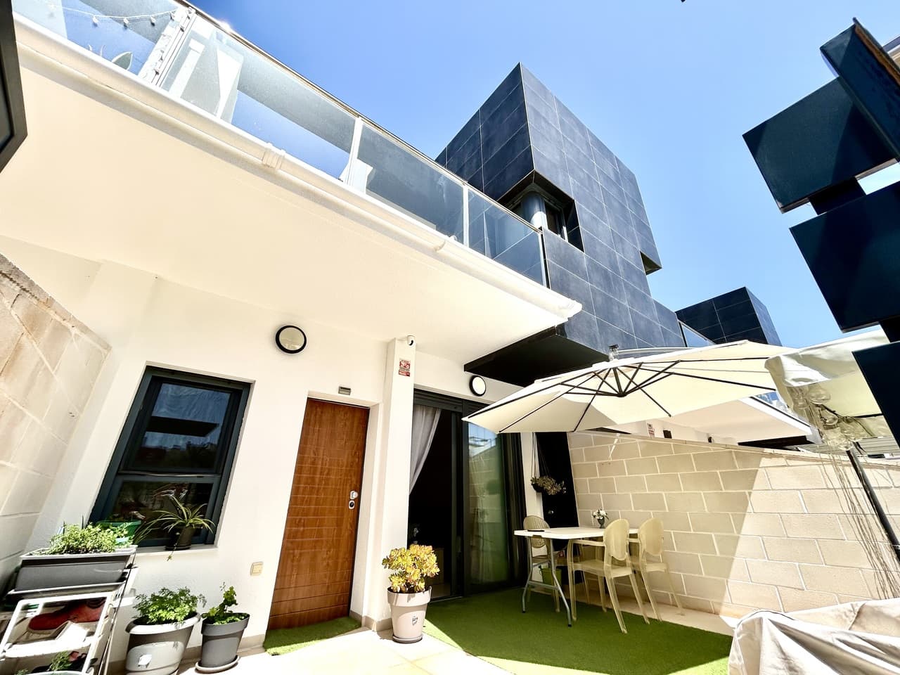 Discover this stunning south-facing 3-bedroom, 3-bathroom townhouse in the beautiful Royal Manantial, offering fantastic views over the lush communal gardens and inviting pool areas.This exceptional property combines space, comfort, and an ideal orientation to enjoy sunshine throughout the day. Upon entering, you’ll find a spacious private garage with direct access into the home—providing both convenience and security. The ground floor features a bright living area, a fully equipped kitchen with a separate utility room, as well as a bedroom and bathroom, perfect for guests or flexible living.Upstairs, both bedrooms benefit from en-suite bathrooms. The master bedroom enjoys direct access to a private balcony with lovely open views, as well as access to a rooftop solarium—an ideal spot for sunbathing or relaxing while taking in the surroundings. The second bedroom also boasts its own private outdoor space, adding to the home’s appeal.Outside, the property offers a sunny private garden, perfect for outdoor dining and entertaining. The gated community is beautifully maintained and features two communal swimming pools, one of which is heated using solar power. Residents can also enjoy a spacious seating area and a children’s playground, making it ideal for families.With four separate entrances, the complex offers both accessibility and exclusivity in a peaceful yet well-connected location.A truly outstanding home, perfect for enjoying the Mediterranean lifestyle in style and comfort.