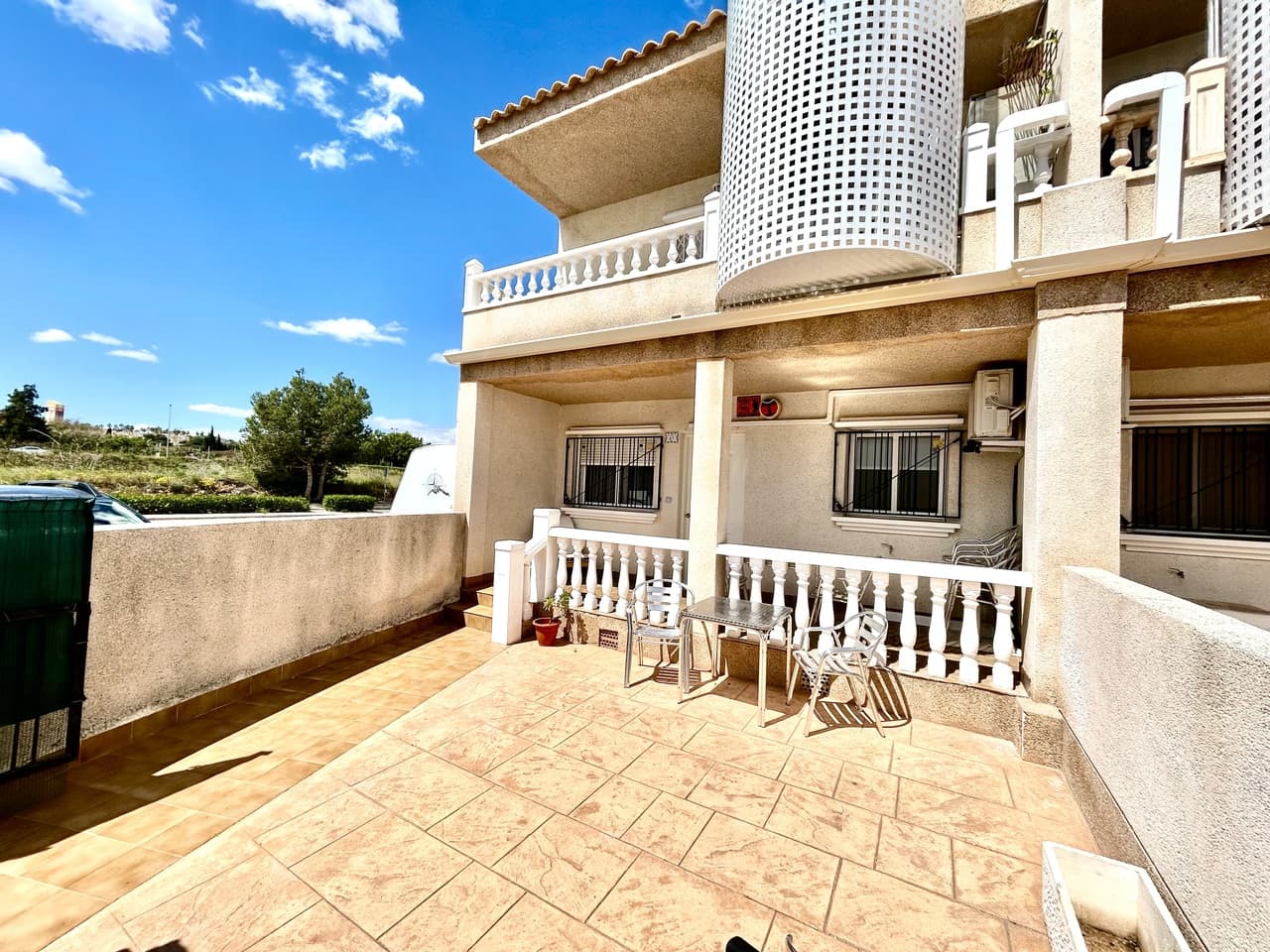 Discover the perfect blend of style, comfort, and location with this beautifully renovated ground-floor apartment in the heart of Villamartín.This spacious 2-bedroom, 1-bathroom home has been fully modernised to a high standard, offering a fresh, contemporary feel throughout. Positioned on a desirable corner plot, the property benefits from a south-facing orientation, flooding the interior with natural light all day long.Step outside onto the sunny private terrace—an ideal space for al fresco dining, relaxing with a morning coffee, or entertaining guests in the warm Mediterranean climate. Inside, the apartment boasts a bright and open living area, a sleek modern kitchen, and two generously sized bedrooms, all designed with comfort and functionality in mind.The property also includes its own private parking space, adding everyday convenience to this already impressive home. Residents can enjoy access to a beautifully maintained communal pool, perfect for cooling off and unwinding.Located just a 10-minute walk from the vibrant Villamartín Plaza, you’ll have a wide selection of restaurants, bars, shops, and amenities right on your doorstep—making this an ideal choice for both full-time living and holiday escapes.A fantastic opportunity to own a stylish, move-in-ready home in one of the Costa Blanca’s most popular areas.