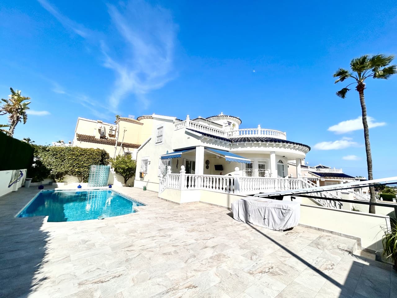 Nestled in the heart of Pinar de Campoverde, this stunning 4-bedroom, 3-bathroom villa offers the perfect blend of comfort, space, and Mediterranean lifestyle — all just a short stroll from local bars, restaurants, shops, and everyday amenities.Designed for both relaxed family living and effortless entertaining, the property boasts a private swimming pool, beautifully landscaped gardens illuminated with solar lighting, and a fully equipped outdoor kitchen — ideal for hosting guests and enjoying long summer evenings. For added peace of mind, the villa is fitted with security cameras throughout.Inside, the home is equipped with oil central heating and air conditioning, ensuring year-round comfort.The main level welcomes you with a spacious and bright living room, complemented by a dedicated dining area and a separate modern kitchen. Also on this floor is the impressive master bedroom featuring a contemporary ensuite bathroom.Downstairs, you’ll find a large entertainment area — perfect as a games room, cinema space, or guest suite — along with an additional bedroom and bathroom, offering flexibility for visitors or extended family.The top floor hosts two further bedrooms and two bathrooms, all finished to a high standard. From here, you can enjoy beautiful sea views, which are also visible from the expansive terrace — a perfect spot for morning coffee or sunset relaxation.Completing the property is a large private garage, providing secure parking and additional storage.This villa combines an excellent central location, generous living space, and desirable outdoor features, making it an exceptional opportunity whether as a permanent residence, holiday home, or investment.