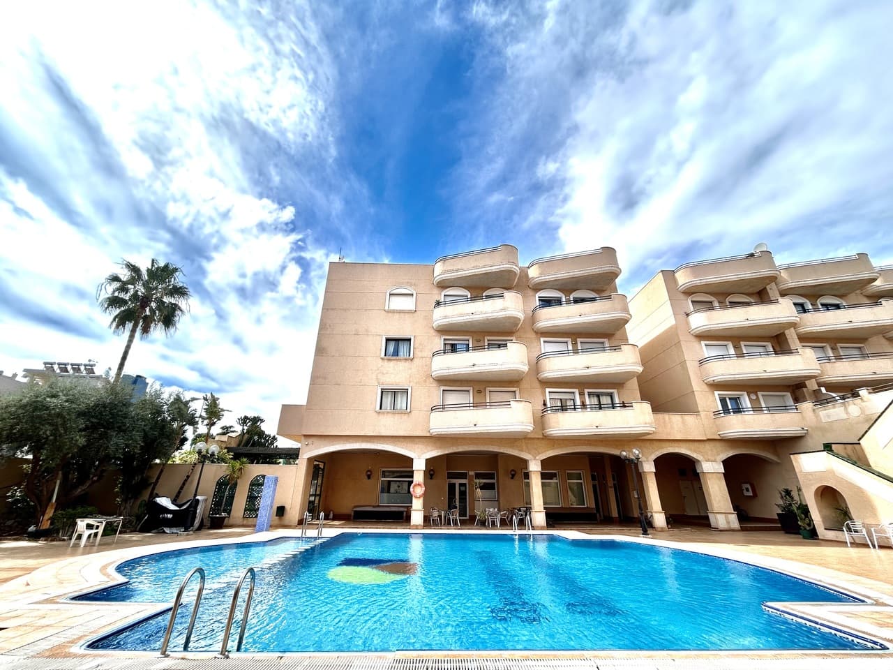 Perched on the top floor in the sought-after Aguamarina area of Cabo Roig, this beautifully presented 2-bedroom, 1-bathroom apartment offers the perfect blend of comfort, location, and lifestyle.Set within a well-maintained building right on the vibrant Cabo Roig strip, you’ll have restaurants, cafés, and amenities just moments from your doorstep, while still enjoying a მშვიდ and private living space above it all. The apartment is bright and airy, benefiting from its top-floor position, and has been carefully maintained, making it ready to move into or enjoy as a holiday retreat.Residents have access to a lovely communal pool and relaxing lounge area—ideal for soaking up the Mediterranean sun or unwinding with family and friends. Best of all, the stunning Cabo Roig beach is less than a 5-minute walk away, offering golden sands and crystal-clear waters whenever you desire.The property also includes a private parking space in the garage, adding convenience and security in this prime coastal location.Whether you’re looking for a permanent home, holiday getaway, or investment opportunity, this apartment delivers exceptional value in one of the Costa Blanca’s most desirable areas.