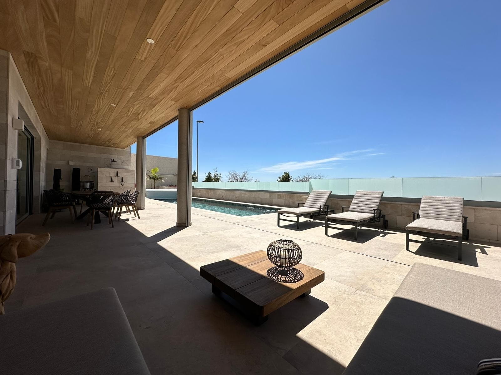 This is not just another villa. This is an extraordinary creation, built with vision, craftsmanship and uncompromising quality. A rare opportunity to invest in a residence that embodies luxury, sustainability, and exclusivity in every detail.

Built on an innovative foundation and equipped with highly efficient insulation (IKO Enertherm Alu TG, specially imported), this villa sets new standards in energy efficiency and comfort. Advanced solar energy systems with storage capacity ensure that energy costs remain minimal – a rare advantage for a property of this scale.

Every detail radiates quality: from the fully electric shutters and sunshades to the state-of-the-art heating system and the modern water purification installation providing pure drinking water throughout the entire villa. All finishes – from flooring to woodwork and sanitary ware – have been meticulously selected and perfectly matched, resulting in aesthetics that exude pure class.

Layout & Living Spaces



 4 spacious bedrooms,   each with its own luxury en-suite bathroom, including an exclusive master   suite with direct access to the pool

 A spectacular 57   m² solarium with breathtaking panoramic views – the perfect setting   for elegant gatherings or unforgettable sunsets

 A beautifully   designed terrace of 176 m² in total, including a large, elegantly   tiled 11 x 4 metre swimming pool. Of this, 46.3 m² is covered

   and can be fully enclosed with stylish, high-quality screens – ideal for   year-round comfort and privacy

 On the side of the   villa, an additional 80 m² garden with lush Mediterranean   landscaping provides extra atmosphere and exclusivity

 An impressive living   area with floor-to-ceiling sliding doors seamlessly connecting indoor and   outdoor spaces



The spacious basement offers a garage for multiple cars, the option of a home cinema, gym or guest suite – the possibilities are endless.

Why this villa is unique

Where similar villas in other prime locations would cost double or even triple, this residence in Benijófar offers unmatched investment potential. More than a home – this is a statement, a lifestyle, and a secure investment for the future.