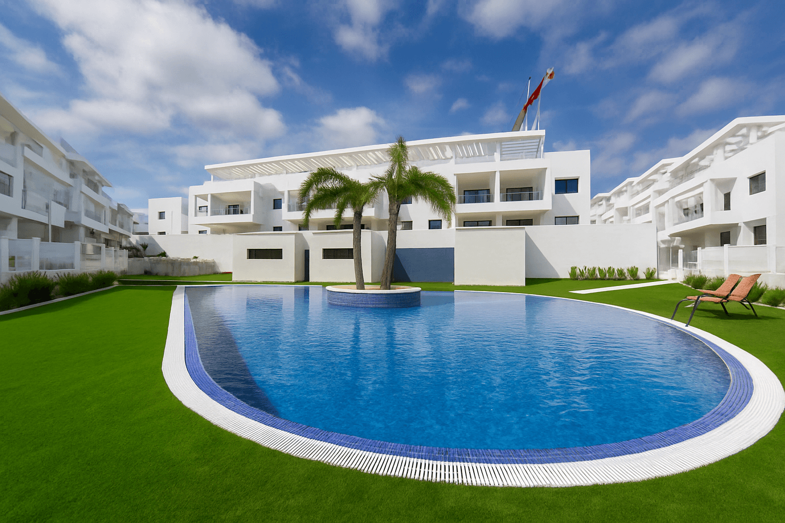 Moderno y luminoso apartamento en planta baja con 2 dormitorios, 2 baños (uno en suite), amplias terrazas y varias piscinas comunitarias.



Bienvenido a esta vivienda casi nueva, decorada con un estilo moderno y acogedor, situada en el corazón de la exclusiva y demandada urbanización Residencial Nalia, en Los Balcones, a las afueras de Torrevieja.



Un hogar que combina materiales de alta calidad, diseño cuidado y un entorno natural privilegiado. Rodeado de senderos, lagunas saladas y rutas para bicicleta, es perfecto para quienes disfrutan de un estilo de vida activo y tranquilo a la vez. Supermercados, restaurantes y todo tipo de servicios se encuentran a pocos minutos andando, y algunos de los mejores campos de golf de la zona – como Villamartín, Las Ramblas o Las Colinas – están a solo un corto trayecto en coche.



La vivienda se encuentra en una soleada parcela en esquina y cuenta con dos fantásticas terrazas que invitan a disfrutar del aire libre todo el año. La principal, orientada al sur y con vistas a una de las bonitas piscinas, es ideal para desayunos largos, tardes relajadas al sol o cenas al aire libre. La segunda terraza, orientada al norte, ofrece vistas mágicas a la Laguna Rosa de Torrevieja y un espacio más fresco para disfrutar en verano o relajarse al final del día. En total, el espacio exterior suma aproximadamente 57 m².



En el interior, la luz natural y el espacio abierto son protagonistas. Dispone de dos dormitorios amplios y dos baños completos con acabados modernos, uno de ellos en suite. Desde uno de los dormitorios se accede directamente a la terraza, creando una conexión perfecta entre interior y exterior.



Los materiales y detalles han sido cuidadosamente seleccionados, con tonos cálidos y un diseño funcional que aprovecha al máximo cada metro. La vivienda incluye una plaza de garaje subterránea de 30 m² y un trastero privado, cuya finalización está prevista para verano de 2025. Además, hay aparcamiento exterior disponible justo en la puerta.



Residencial Nalia ofrece varias zonas comunes con piscinas impecablemente cuidadas, gimnasio y espacios para socializar, todo en un entorno seguro y moderno.



Un lugar donde la tranquilidad de la naturaleza y la comodidad de la ciudad se dan la mano. Perfecto para vivir todo el año o como segunda residencia en la Costa Blanca.
