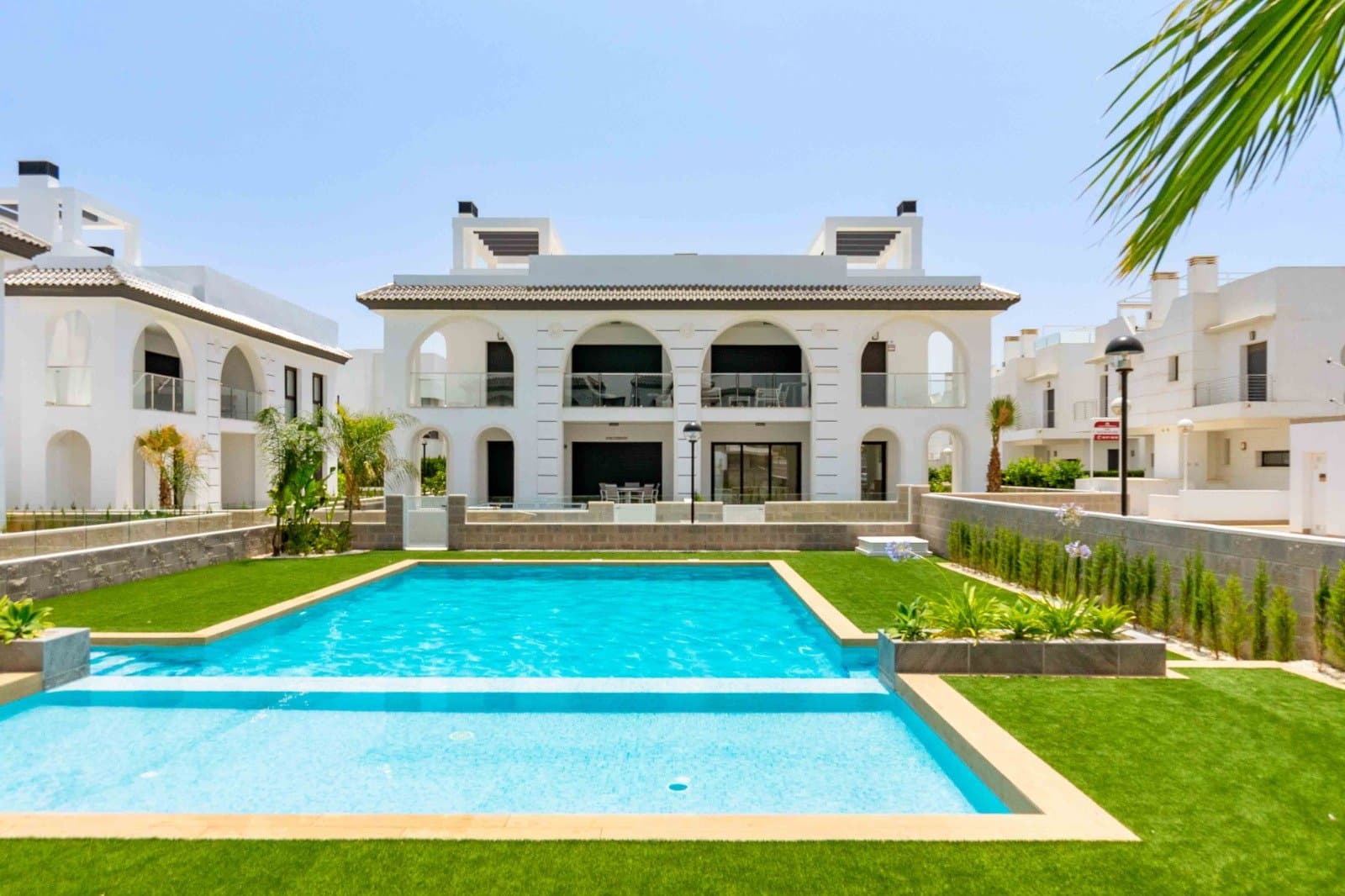 This outstanding luxury penthouse represents the pinnacle of contemporary Mediterranean living, finished to an exceptional standard with superior construction quality, premium materials, and carefully curated, elegant interiors. Every detail has been thoughtfully considered to create a residence that combines sophistication, comfort, and functionality.A standout feature of the property is the impressive 90m² private solarium, offering uninterrupted panoramic views across the surrounding lagoons. This expansive outdoor space is ideal for both relaxation and entertaining, providing the perfect setting to enjoy the year-round sunshine and tranquil natural surroundings.Situated in the highly sought-after area of Ciudad Quesada, the property enjoys a privileged position within an exclusive gated community, ensuring both privacy and security. Residents benefit from beautifully maintained landscaped gardens, a private communal swimming pool, and allocated parking, all designed to enhance a relaxed and refined lifestyle.The Enora Residential development has been meticulously designed to meet the highest expectations of modern living. It offers a collection of stylish two-bedroom apartments and penthouses, each featuring either private gardens or generous solarium spaces. Ciudad Quesada is a well-established and thriving residential destination, offering an excellent range of amenities with over 300 local businesses. A variety of restaurants, cafés, supermarkets, bars, bakeries, and fitness facilities are all within easy reach, alongside essential services such as medical centres, international schools, and an abundance of nearby natural landscapes.This exceptional property presents an ideal opportunity as a permanent residence, a luxurious holiday retreat, or a high-performing investment with tourist licence in place offering a rare combination of elegance, location, and lifestyle!!