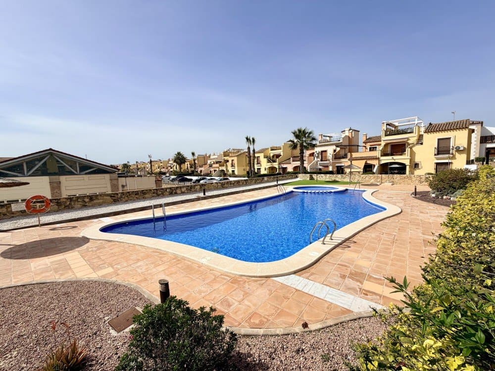 This elegant bungalow is located in the exclusive urbanisation of La Finca Golf, within the municipality of Algorfa, one of the most sought-after residential areas on the Costa Blanca, renowned for its tranquillity, security and privileged natural surroundings.The property boasts an excellent location, just a one-minute walk from the La Finca Golf commercial centre, where you will find a wide range of restaurants, cafés, supermarkets and essential services, ensuring convenience and a high quality of life all year round.The bungalow features two spacious bedrooms, designed to offer maximum comfort, and two fully fitted bathrooms, one of them en suite, providing both privacy and practicality. The layout has been carefully designed to maximise natural light, creating bright and welcoming living spaces.Externally, the property offers a large terrace, ideal for enjoying the Mediterranean climate, as well as a nice solarium fully furnished with a chill-out area and a large awning, perfect for relaxing, entertaining guests or simply enjoying the open views.The development includes a well-maintained communal swimming pool surrounded by landscaped gardens, along with allocated parking space, adding both convenience and security.For golf enthusiasts, the prestigious La Finca Golf course is just a 3-minute drive away, making this property ideal both as a permanent residence and as an investment opportunity. Furthermore, the beautiful beaches of Guardamar del Segura are only 15 minutes away by car, known for their fine sand, crystal-clear waters and extensive pine forests.The area of Algorfa and La Finca Golf perfectly combines the peace of a residential setting with close proximity to all amenities and coastal attractions, offering a relaxed, healthy lifestyle with a high standard of living.In summary, a property that brings together location, comfort and surroundings, ideal for enjoying the true Mediterranean lifestyle!!