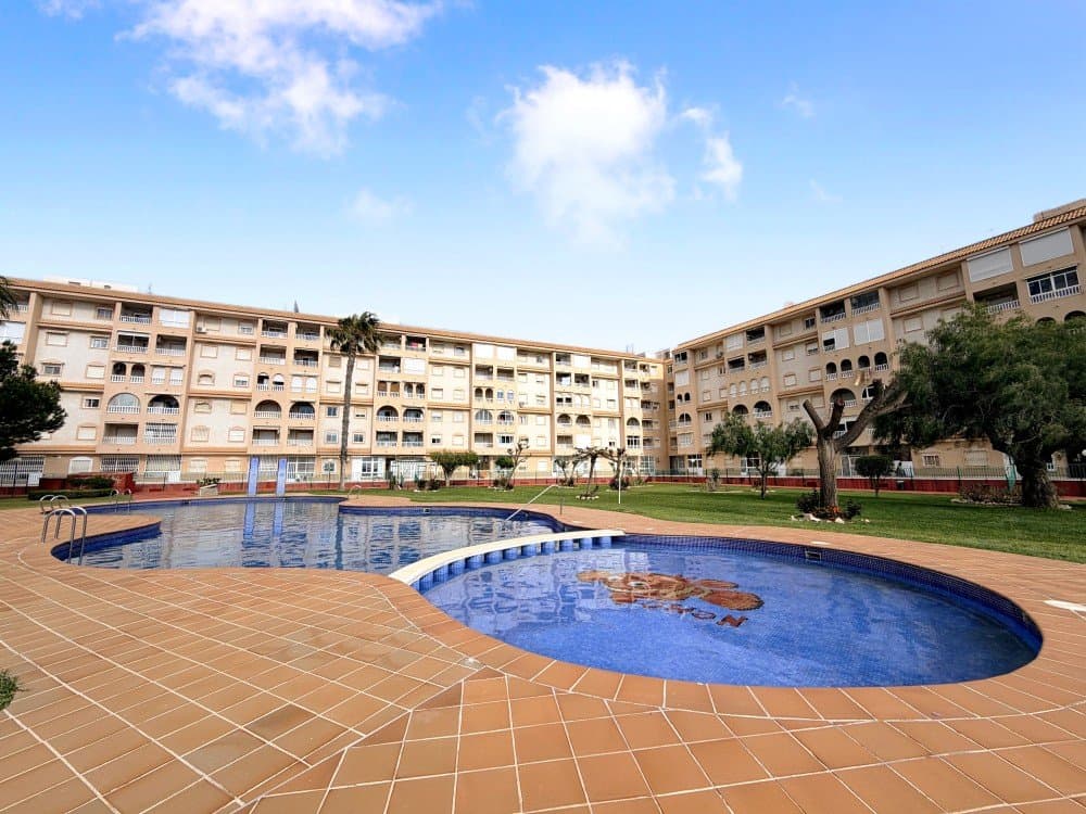 Discover this exclusive penthouse in Torrevieja, a unique opportunity to enjoy the Mediterranean lifestyle in one of the most sought-after areas of the Costa Blanca. Located on Calle Villa Madrid, just 200 metres from the beach, this property perfectly combines comfort, location and modern design.The property was fully renovated in 2020 and is presented in impeccable condition, featuring contemporary finishes that enhance brightness and space throughout. It offers 2 bedrooms, ideal for both permanent living and holiday use, along with a fully equipped bathroom designed with quality materials and a functional style.One of the standout features of this penthouse is its large double balcony, perfect for enjoying the region’s exceptional climate, relaxing outdoors or entertaining family and friends. In addition, the building offers a communal swimming pool and landscaped gardens, providing ideal spaces for leisure and relaxation.The property also benefits from a lift and air conditioning in all rooms, ensuring maximum comfort all year round.Regarding its location, it is just a one-minute walk from a wide range of bars, shops and restaurants, allowing you to enjoy all amenities and the local atmosphere without the need for a car. Torrevieja is renowned for its excellent climate, beautiful sandy beaches and vibrant year-round lifestyle, making it an ideal destination for both living and investment.Don't miss this great opportunity!!