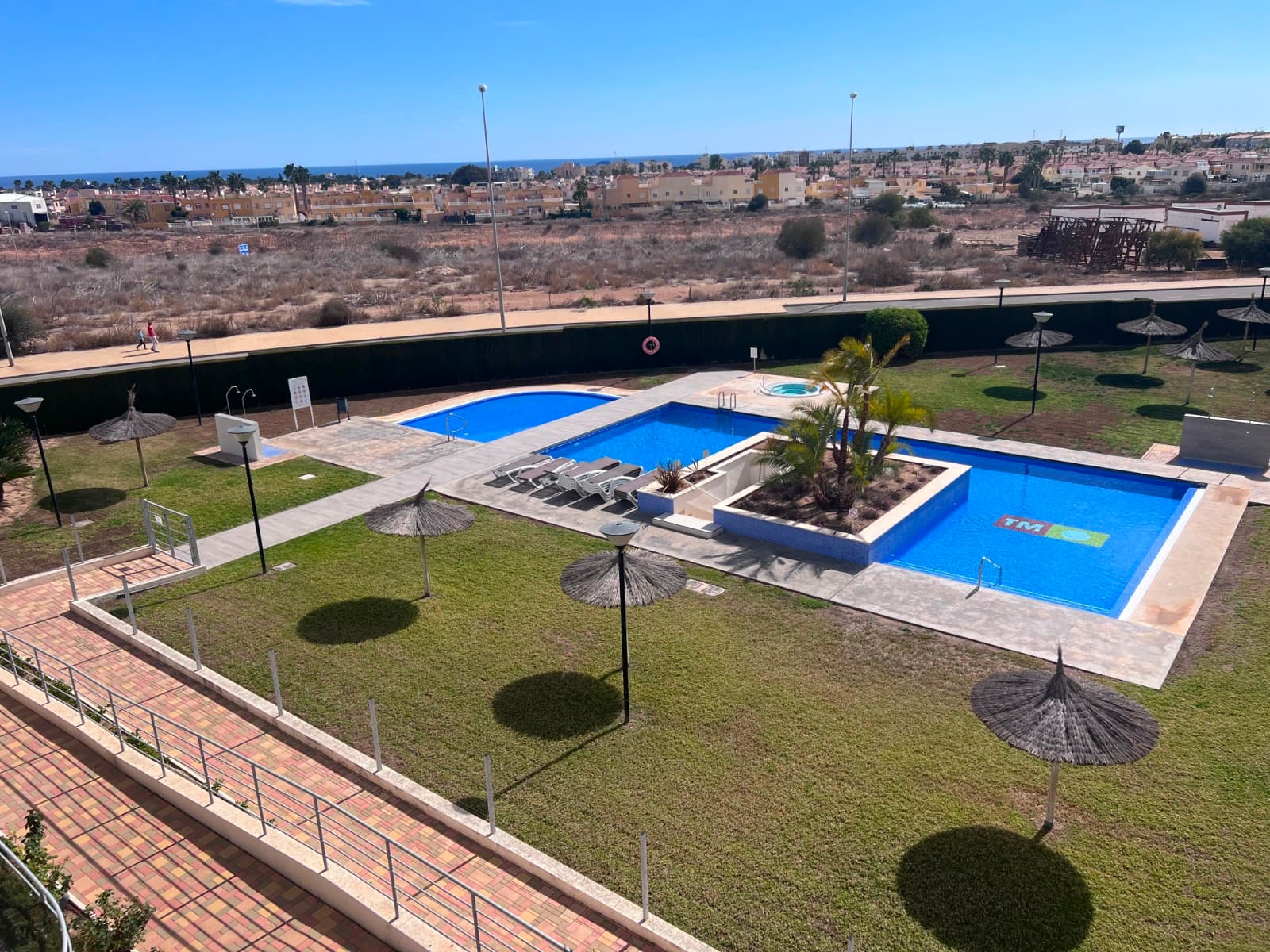 Welcome to this modern 3-bedroom apartment nestled in the prestigious Lomas de Campoamor community. Step into luxury with a spacious layout designed to maximize comfort and style. The sleek interior features an open-concept living area, perfect for entertaining guests or relaxing with family. Floor-to-ceiling windows flood the space with natural light, creating an airy ambiance throughout.The gourmet kitchen boasts state-of-the-art appliances, quartz countertops, and ample storage space, catering to the needs of any home chef. Adjacent to the kitchen, a chic dining area provides a sophisticated setting for enjoying meals together.Retreat to the master suite, complete with a lavish ensuite bathroom and private access to the expansive solarium. This outdoor oasis offers panoramic views of the surrounding landscape, ideal for basking in the Mediterranean sun or hosting al fresco gatherings.Two additional bedrooms offer comfortable accommodations for family members or guests, while a second bathroom ensures convenience and privacy for all. With modern amenities such as central air conditioning, smart home technology, and designated parking, this apartment epitomizes contemporary luxury living.Located in the sought-after Lomas de Campoamor community, residents enjoy access to exclusive amenities including a sparkling swimming pools, outdoor jacuzzi, outdoor exercise areas landscaped gardens, and alarmed secure parking . Explore nearby beaches, championship golf courses, and a variety of dining and entertainment options, all within reach of this exceptional property. Experience the epitome of modern Mediterranean living in this stunning 3-bedroom apartment with a spacious solarium in Lomas de Campoamor.