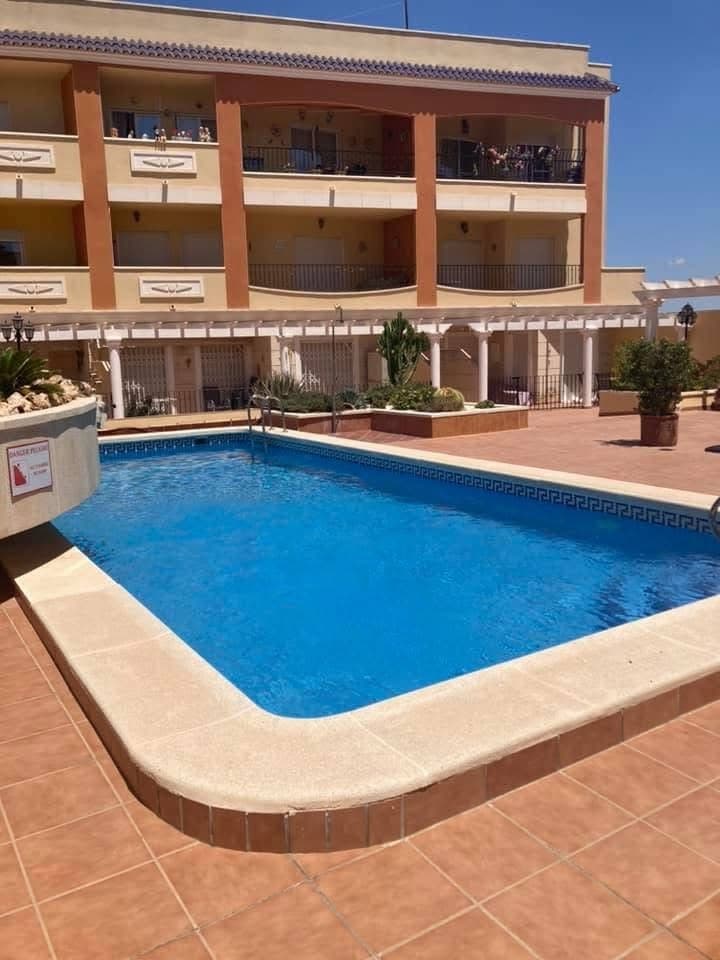 New listing in Residential "El Patio" in Algorfa village, ground floor apartment overlooking the pool with one bedroom, one bathroom, open plan living area and parking space. Near all amenities by foot