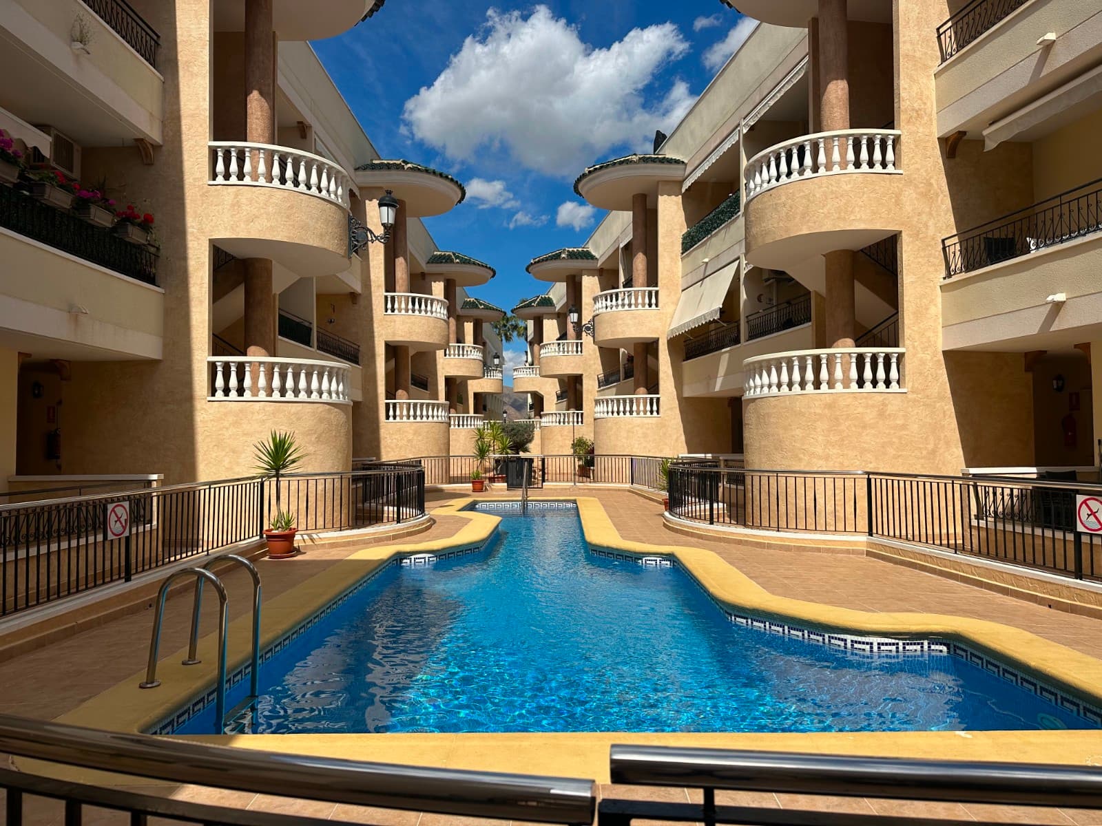 This beautifully presented 2 bedroom, 2 bathroom ground floor apartment is located in the sought after Marquesas IV complex in Alicante. Positioned directly in front of the communal pool, the property enjoys a lovely front porch, perfect for relaxing and enjoying the view.

Inside, the apartment features a bright, open plan living and dining area, a renovated kitchen with modern finishes, and two bathrooms, both have been updated. Both bedrooms offer built in wardrobes and plenty of natural light, creating a welcoming and practical living space.

Set in a well maintained community with landscaped gardens and a large pool, this home is ideal as a permanent residence, holiday home, or rental investment. Local amenities, restaurants, and shops are just a short walk away.


