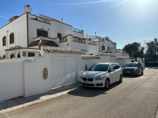 West facing quad townhouse in Entre Naranjos urbanization , Orihuela beside vistabella golf course.The house comprises of a great size garden with storage ,glazed terrace, open plan living/dining room with wood burner and separate kithen, double bedroom (currently used as a dining room) and bathroom with shower on the ground floor. On the first floor there are 2 more double bedrooms and a family bathroom and a terrace off the main bedroom. Stairs lead up to the sun drenched solarium with nice views. The community pool is only 50 meters away