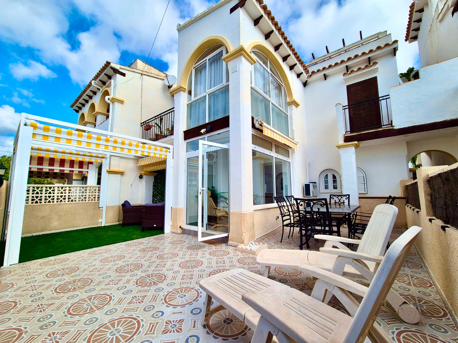 This exceptional south-facing apartment in the sought-after Mirador Del Mediteraneo urbanisation of San Miguel de Salinas offers a rare opportunity to own a one-bedroom property of significant proportions. Spanning over 80 square metres, the residence provides a sense of space and flow far beyond the industry standard, featuring a large double bedroom with integrated USB charging points and a high-spec kitchen fully equipped with a dishwasher, oven, and microwave. The expansive living and dining area is designed for year-round comfort with dual air conditioning and opens onto a substantial, enclosed private patio. This "escape-proof" outdoor sanctuary is perfect for alfresco dining and lounging, offering privacy . Residents also benefit from exclusive access to four beautifully maintained community swimming pools, providing a variety of options for relaxation and leisure just moments from the door.​The property is thoughtfully designed with a modern heated wet room and a separate utility room for laundry and storage, ensuring the main living areas remain uncluttered. Located in a tranquil, elevated position, the apartment is just a short stroll from local convenience shops and bars, Pádel courts, and Greenlands Adventure Golf. For more vibrant entertainment, the famous Villamartin Plaza is only a 15-minute walk away, while major supermarkets and the authentic Spanish charm of San Miguel de Salinas village—complete with its traditional fiestas and medical facilities—are accessible within a 5 to 10-minute drive. This is a unique, spacious home that perfectly balances quiet residential living with immediate access to world-class amenities and multiple leisure facilities