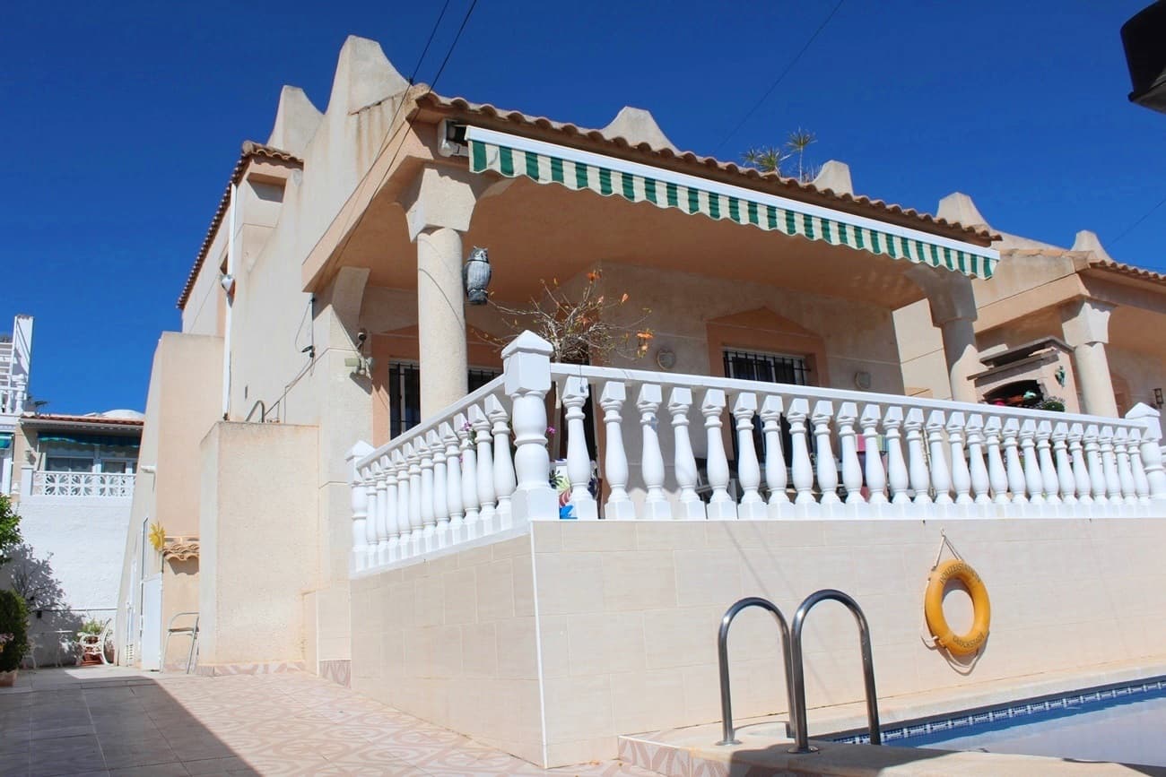 "READY TO MOVE IN" This wonderful 103m2 detached VILLA with 3 bedrooms, 2 bathrooms is located in BLUE LAGOON, SAN MIGUEL DE SALINAS on a plot of 200m2 with a private12m2 pool and various sunny terraces. On the ground floor there are 2 double-sized bedrooms, 1 renovated bathroom, an open plan fully equipped kitchen, a large living/dining room and a storage room. Entering through a staircase from the outside you will find on the 1st floor a separate spacious studio flat with a bedroom, separate shower room, kitchenette and a living room which leads out to a large terrace area with a BBQ and beautiful views! On the 2nd floor is another large roof terrace with a solar panel for hot water and an amazing view of the sea and salt lakes! The property is situated in a very quiet area with sun all around the house and is in walking distance to all amenities, supermarkets (Mercadona and Aldi), restaurants and bars, new public pool, “Green Lands ”, Minigolf, El Limonar - International School and the popular Villamartin PLAZA and La Fuente commercial centre is very near. The beautiful beaches of Orihuela Costa only 4km away and the famous shopping centre Zenia Boulevard with over 150 shops, bars and restaurants is only a few minutes’ drive by car.Many extras include; electric entrance gate, laundry room, fly screen blinds on ALL windows upstairs and downstairs, 4 air conditioning units hot & cold gas central heating and it is sold fully furnished.  Blue Lagoon is surrounded of the most beautiful golf courses in the area Real Club de Campoamor, Las Ramblas, Villamartin, Las Colinas etc... This is a home to live in all year around and has a very good RENTAL POTENTIAL. Corvera Airport in Murcia and El Altet Airport in Alicante are both 45 minutes’ drive by car.