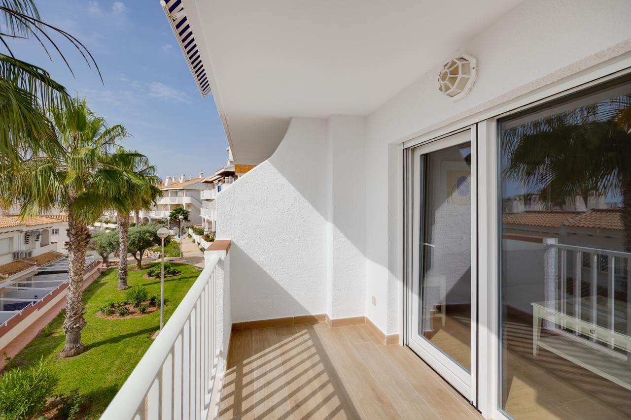 Ready to move into this beautiful, fully renovated first-floor apartment with 2 bedrooms, located just 300meters from the Aquamarina – Dehesa de Campoamor Beach. This modern apartment has70 m² and consists of 2 bedrooms with fitted wardrobe,1 modern bathroom with shower, spacious and bright living / dining area with a large sliding door that opens onto a 12 m2 sunny balcony overlooking the community green area, making it the perfect place to relax, have breakfast, or watch the sunrise over the Mediterranean Sea and as well as a independent fully equipped kitchen with utility area.The apartment is located in a residential complex with a communal pool, fully furnished and is equipped with air conditioning C/W in all rooms to ensure maxim um comfort throughout the year. Just a short walk from supermarkets ,restaurants, cafes, pharmacy, beach bars, water sports and all kinds of services, it is very close to Zenia Boulevard, the largest shopping centre in the province of Alicante with over 150 shops. Just a 10-minute drive takes you to 4 internationally renowned golf courses Villamartín, Las Ramblas, Campoamor and Las Colinas. Aquamarina - Dehesa de Campoamor Beach is one of the most sought-after areas of Orihuela Costa, perfect for permanent residence or investment. Don't miss the opportunity to live the dream in this magnificent apartment by the sea with exceptional amenities on your doorstep! The airports of Alicante and Murcia (Corvera) are only 45 min drive away. This highly popular area with close proximity to ALL amenities makes this property perfect for a holiday home, permanent residence or a great rental opportunity, so be quick as it will not be on the market for long. MUST BE SEEN !