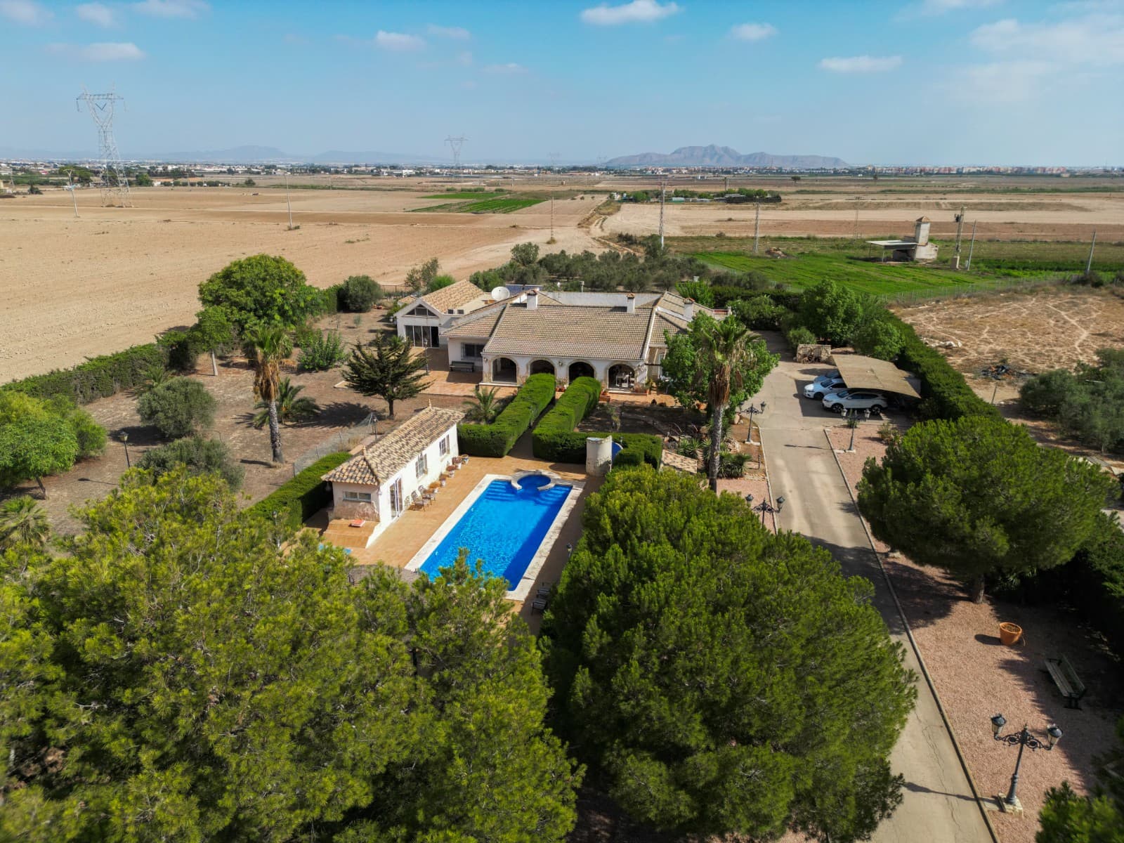 Discover Finca La Puebla, Perfect Family Retreat in Murcia's Tranquil BeautyWelcome to this captivating Finca that embodies the essence of joyful family living. Nestled a mere 10 minutes away from the pristine shores of Bahia Bella and a short 15-minute drive to the enchanting beauty of Cartagena, this gem of a property boasts convenience and leisure at every turn. The prestigious Caleia Mar Menor golf & spa resort is also just around the corner, providing a touch of luxury to your lifestyle.

As you step onto the expansive grounds of this finca, you're greeted by sprawling gardens that embrace the spirit of outdoor fun and relaxation. Imagine basking in the Spanish sun while your children laugh and play in the lush surroundings. A symphony of laughter and joy fills the air as the outdoor pool invites the family to endless days of aquatic delight. The terrace, complete with a charming kitchen, becomes the heart of al fresco dining, where every meal becomes a cherished memory.

Inside, a world of endless possibilities unfolds. With 6 thoughtfully designed bedrooms, there's space for everyone in the family – and even for those friends who feel like family. The indoor pool offers year-round aquatic enjoyment, while the gym caters to the health-conscious members of the household. Step onto the private terrace, a secluded oasis where you can unwind and soak in the serenity that surrounds you.

A true highlight of this finca is the traditional library, a sanctuary where you can escape into literature or focus on your work, all while relishing in the view of the enchanting patio. The seamless flow of space allows you to open up the living room to the porch, creating a harmonious indoor-outdoor living experience that perfectly complements the classic architectural lines of the finca.

For those who cherish the company of loved ones, this property is a haven. It's an ideal haven for happy families who revel in the company of guests, as it effortlessly accommodates gatherings both intimate and grand. With its proximity to Los Alcázares and La Manga del Mar Menor in Murcia, every day can be an adventure waiting to be explored.

Don't let this opportunity slip through your fingers – seize the chance to own a piece of paradise. Reach out to us today for more information, and let us guide you into a future where cherished moments and boundless joy await.



