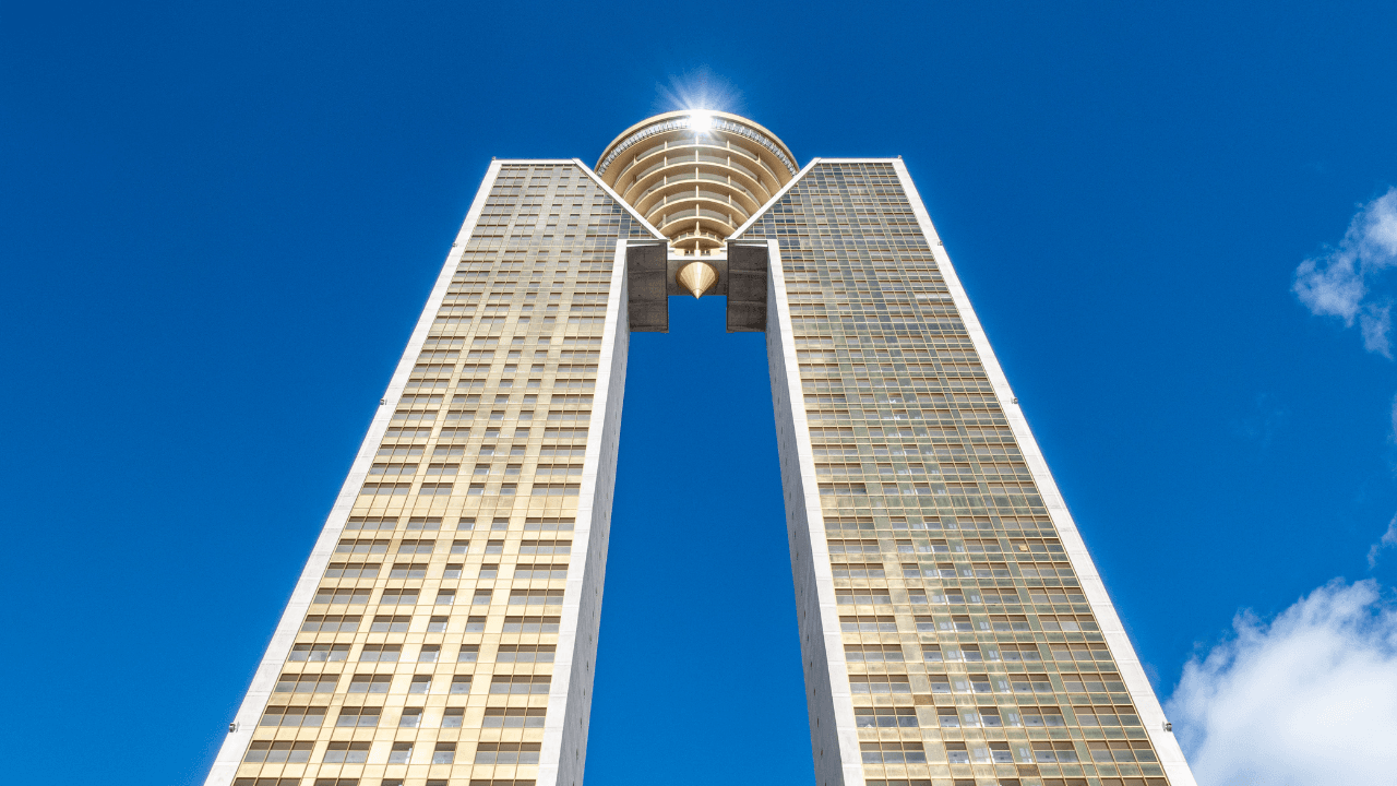 Exclusive and Luxurious Apartment in the Iconic IN TEMPO - Diamond Residence Urbanization. With a Valid Tourist Rental License.Discover luxury and exclusivity in the emblematic Intempo building in Benidorm, the architectural jewel of the Costa Blanca and the tallest residential skyscraper in Spain. Standing at 202 meters high with its iconic design, this building offers an unparalleled living experience, combining comfort, security, and a sophisticated lifestyle in a prime location.We present to you this exclusive 2-bedroom, 2-bathroom apartment, a property designed for those seeking maximum comfort and spectacular views of the Mediterranean Sea and Benidorm’s skyline. The home features a spacious, modern, and elegantly designed living-dining area with large windows that allow natural light to flood in throughout the day, creating a warm and bright atmosphere. The independent kitchen is fully equipped with high-end appliances, perfect for cooking enthusiasts.One of the great highlights of this property is its stunning 16 m² terrace, a perfect space to enjoy unforgettable sunrises and sunsets, relax outdoors, or share special moments with family and friends. Additionally, the property includes a spacious parking space suitable for large vehicles and a 12 m² storage room, providing convenient extra storage.Living in Intempo means enjoying a range of exclusive services and amenities that make this building a true luxury landmark in the region. The urbanization offers 24-hour private security, ensuring peace of mind and protection at all times. For those looking for well-being and entertainment without leaving home, Intempo provides two fully equipped gyms, a modern coworking space ideal for remote work, and a private café where you can enjoy an exclusive atmosphere.One of the standout features of this skyscraper is its impressive spa, located 198 meters above the ground—the highest in the world—where you can unwind and relax while taking in breathtaking panoramic views. Additionally, residents and their guests have access to a solarium with a jacuzzi, an exclusive space where comfort and luxury merge to offer a unique experience.The location of Intempo is simply unbeatable. Situated on Poniente Beach, it is just minutes away from Benidorm’s finest beaches, known for their fine sand and crystal-clear waters. You’ll also be surrounded by a wide range of top-tier restaurants, exclusive shops, and a vibrant nightlife, making this an ideal spot for both year-round living and a second home.This apartment has a valid tourist rental license, making it an excellent investment opportunity with high profitability assured in one of the most sought-after cities in the Mediterranean.If you are looking for a property that combines luxury, exclusivity, and an unbeatable location, this apartment in the Intempo building is the perfect choice. Don’t miss the opportunity to be part of this iconic skyscraper and enjoy an unparalleled quality of life. Contact us for more information and to schedule a visit to this extraordinary property.Summary:Property Features:Bedrooms: 2 spacious bedrooms.Bathrooms: 2 full bathrooms.Living-Dining Room: Spacious and bright, ideal for gatherings and relaxation.Independent Kitchen: Fully equipped with high-end appliances.Terrace: 16 m² with panoramic views of the Mediterranean Sea and Benidorm.Parking Space: Large space, suitable for big vehicles.Storage Room: 12 m² for additional storage.Intempo Building Services and Amenities:Security: 24-hour private security, ensuring peace and protection.Tourist Rental License: Property with a valid license, offering an excellent investment opportunity.Gyms: Two gyms equipped with state-of-the-art machinery.Coworking Area: Modern and functional space for working or studying.Private Café: Exclusive atmosphere for residents and their guests.World’s Highest Spa: Located at 198 meters high, offering a unique relaxation experience.Solarium with Jacuzzi: Exclusive space for visitors, perfect for enjoying the Mediterranean climate.For more information, contact us.