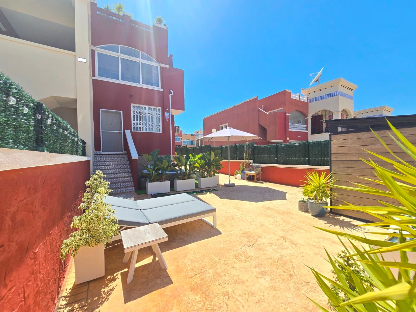 Charming ground-floor flat in excellent condition, ideal for those seeking comfort and outdoor space. Located in the popular Orihuela Costa – Los Altos, with a selection of bars, restaurants and shops within walking distance.This cosy apartment features 2 bedrooms and 2 bathrooms, one of which has been practically converted into a handy utility room.The light-filled living area with open-plan kitchen creates a pleasant and modern living experience. With a living area of 72 m², the layout has been optimally utilised.A real highlight is the spacious, sunny garden of no less than 158 m², perfect for relaxing or enjoying time with family and friends. The garden features a pergola, a garden shed and several cosy seating areas.The apartment also features:Private parking spaceCommunal swimming poolAir conditioningFitted wardrobesPartially furnishedThanks to the abundance of natural light and the peaceful location, this is the ideal place to unwind, whether as a permanent home or a second home.SUMA: 215 euros per year.Community costs: 300 euros per year.