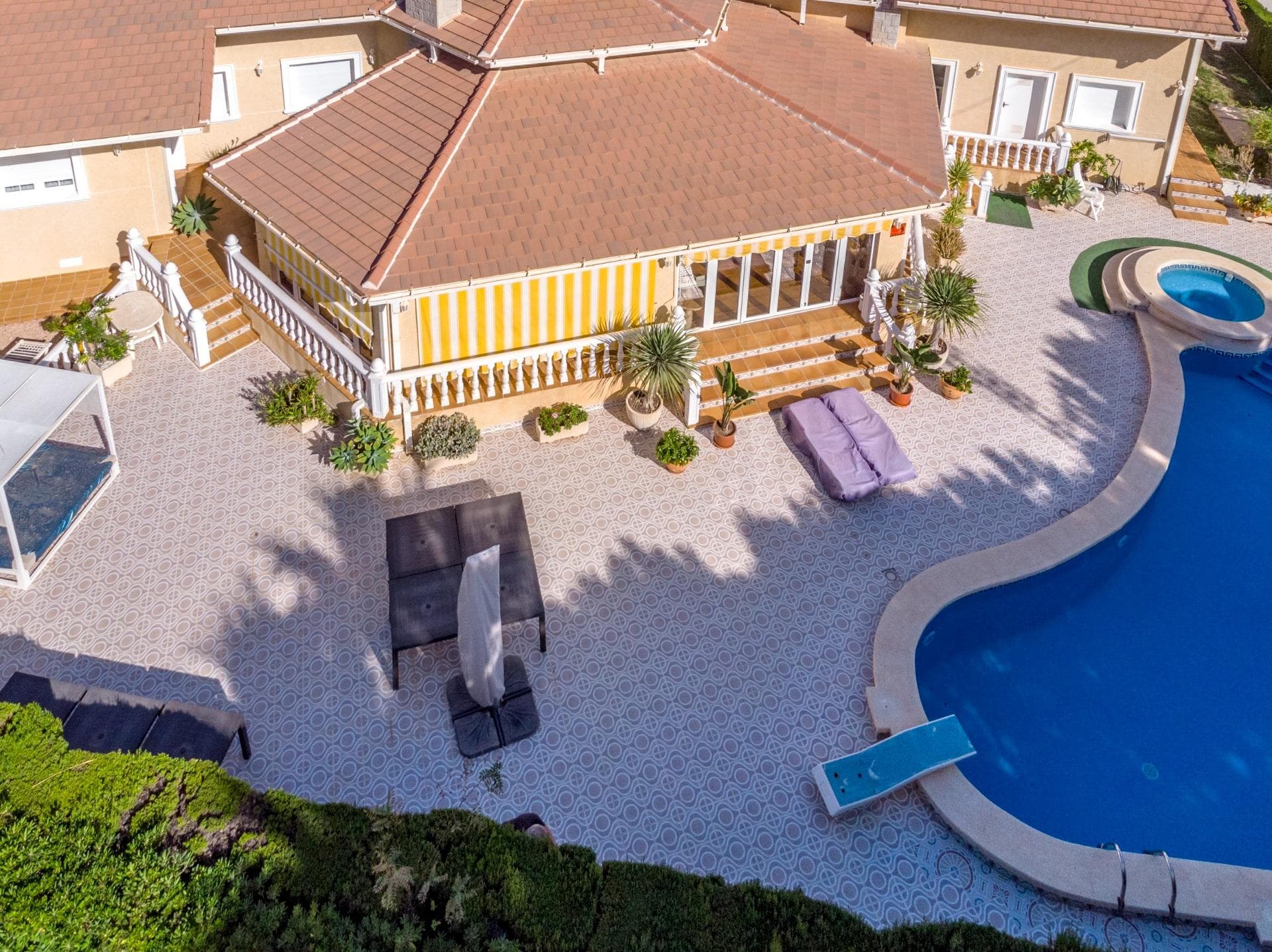 This splendid detached villa 300sqm is conveniently located just a 3-minute stroll from the beautiful beaches of Cabo Roig and its Marina. Situated on a generous plot of 1425m2, the property boasts 3 spacious bedrooms, along with 4 bathrooms, a gym and sauna with its own toilets. The expansive living room features a dining area and a cozy fireplace, complemented by fitted kitchen with a utility area. A highlight of the property is its vast private garden and numerous terraced areas surrounding the residence. Outdoor amenities include a barbecue area, pergola for al fresco dining, garage, and a generously sized private swimming pool. The property is offered for sale fully furnished, providing a turnkey solution for prospective buyers. Cabo Roig, situated 10 kilometers south of Torrevieja on the southern Costa Blanca, offers a delightful town with palm-lined avenues and landscaped gardens providing picturesque views of the Mediterranean towards the La Manga peninsula and the Mar Menor. The charming beaches add to the appeal of this location, and the old town of Cabo Roig is known for its broad avenues and delightful ambiance. Conveniently located, Cabo Roig is less than an hour's drive from Alicante Airport and approximately 30 minutes from Murcia San Javier Airport. Golf enthusiasts will appreciate the proximity to numerous championship courses, including the three Villamartin courses, and the renowned La Manga golf complex is also easily accessible. Cabo Roig's beach, often referred to as the winter beach, offers a variety of water sports, such as Paddle Sup, Kayak, jet skis, and boat rentals. Live music at the beach bars enhances the vibrant atmosphere. Recommended dining options include La Bahía and Stella Maris, known for their wide and high-quality menus. The property is close to the Agua Marina area, offering a diverse selection of restaurants, bars, a market with a street market every Thursday, a health center, pharmacies, coffee shops, and ice cream parlors. Contact us for more information.