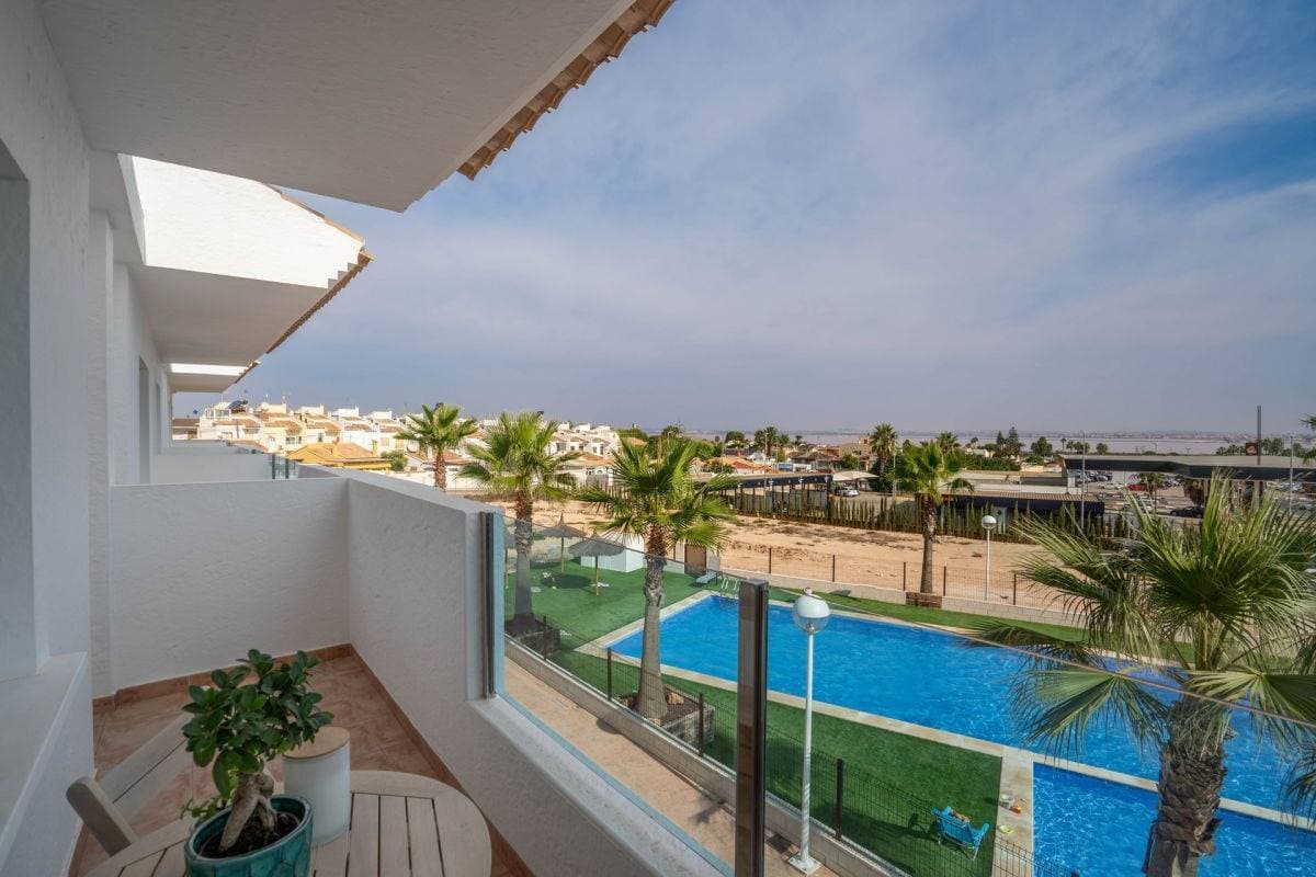 Exclusive Renovated Apartment in Torrevieja – Los Balcones Area - Los Altos del Edén ✨ Discover this incredible 115 m² apartment in one of the most sought-after areas of Torrevieja, just 1,200 meters from the beach. Tastefully renovated and designed to offer maximum comfort and quality of life, this property has three large double bedrooms, two full bathrooms and two toilets, ideal for families or those looking for a spacious and bright home. Its spectacular 70 m² terrace is perfect for enjoying the outdoors, with unobstructed views and a peaceful atmosphere within an exclusive development with a communal pool and gardens. Highlighted Features: 🏡 Renovated property, ready to move into 🌿 Northeast facing, natural light throughout the day 🌟 Interior woodwork and aluminum-wood exterior 🌳 Wooden floors, providing warmth and elegance ❄️ Air conditioning and heating for an ideal climate all year round 🔐 Alarm system for added security Extras and Amenities: ✅ Built-in wardrobes in all rooms ✅ Private balcony and patio ✅ Community pool and garden areas ✅ T.V. connection and electrical installation in perfect condition ✅ Quiet urbanization with nearby services Unbeatable location: 📍 Los Balcones - Los Altos del Edén area, surrounded by all essential services: 🚌 Buses and transit areas with excellent communication 🏖️ A few minutes from the coast 🏥 Close to hospitals and medical centers 🎓 Close to universities and schools 🛍️ A step away from shopping centers and supermarkets 🏌️‍♂️ Ideal for golf lovers 📌 Community fees: €25/month 💰 Sale price: €344,950 📞 Call us and schedule your visit today! 🌟