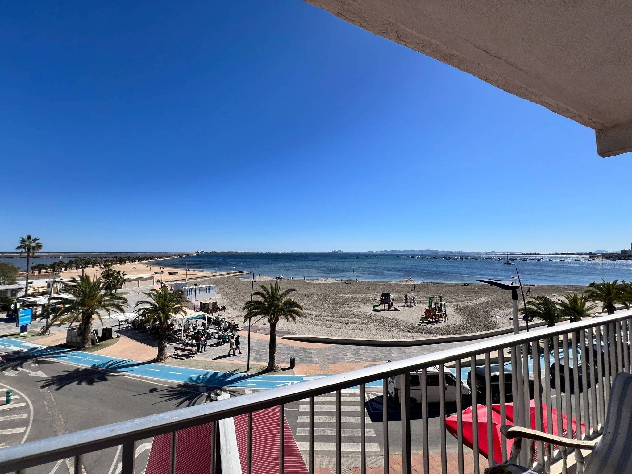 Discover this spectacular apartment located right on the beachfront, in one of the most desirable areas of San Pedro del Pinatar. With a surface area of 100 m², this bright corner property offers all the comfort you need to enjoy the Mar Menor like never before. It features three spacious bedrooms, one bathroom, a fully equipped kitchen, and a cozy balcony with stunning sea views. Its south-facing orientation ensures natural light throughout the day, while tiled floors and aluminum-climalit windows provide a modern and comfortable atmosphere. Additionally, it comes with built-in wardrobes, television, and is located in a central area surrounded by all services: supermarkets, schools, medical centers, hospitals, parks, and playgrounds, with excellent bus connections, natural surroundings, and nearby shopping areas. Ideal as a permanent residence, second home, or investment, this apartment combines a privileged location, spaciousness, and comfort in an unbeatable setting. Community fees: €400/year. Don’t miss this unique opportunity to wake up every day to the sound of the sea. Contact us and come visit!  Contact us and come visit!
