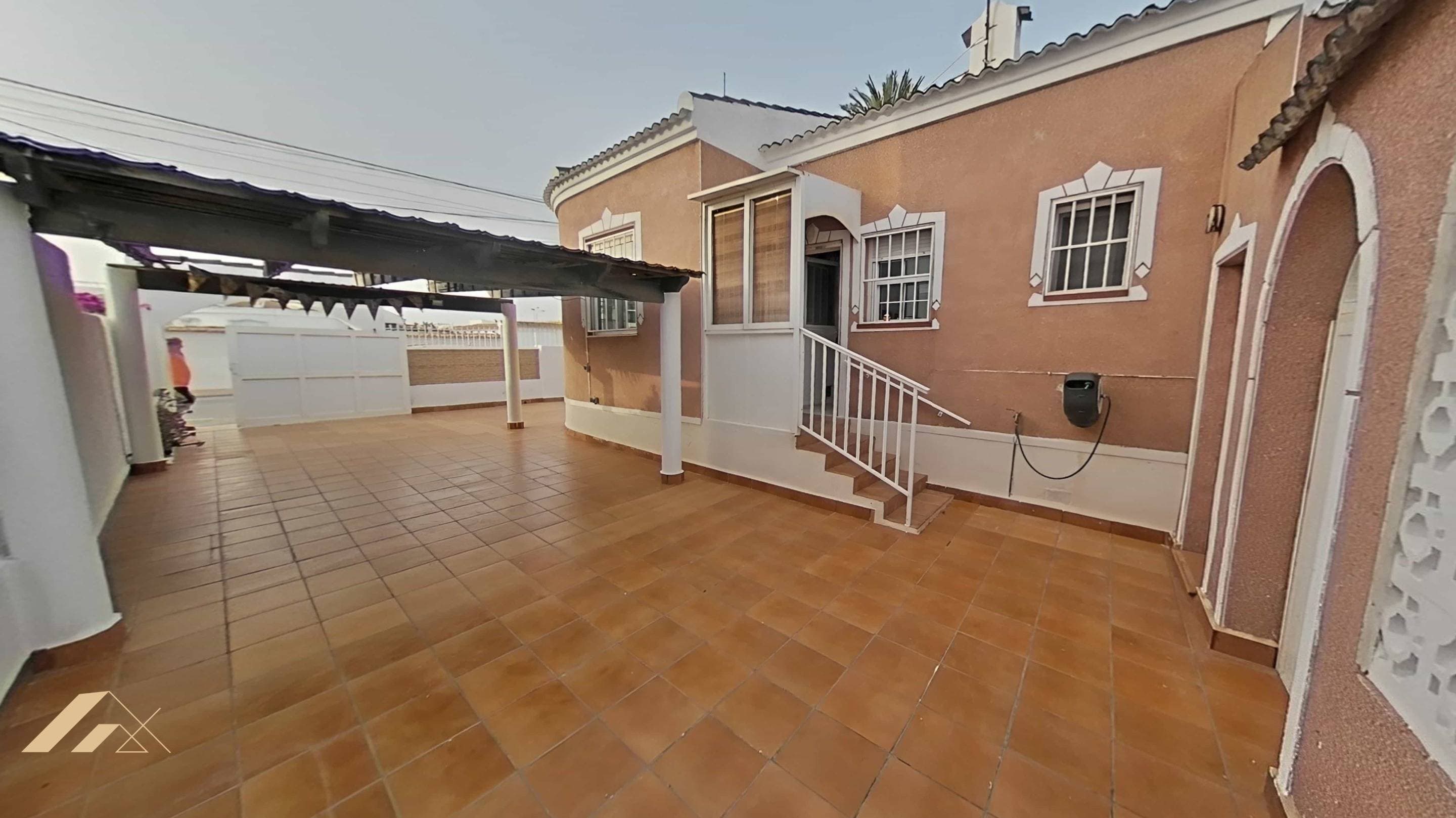 Discover this impressive property located in the quiet area of ​​San Luis, Torrevieja. Just a few meters from Mercadona and very close to the Las Habaneras shopping center, this villa is ideal for those seeking comfort and style in a family-friendly setting. With a constructed area of ​​145 m² and a usable area of ​​130 m², the home offers three spacious double bedrooms that provide natural light thanks to its east-west orientation, a spacious living room, and a room that could be used as an office or playroom. Enjoy the luxury of two fully equipped bathrooms, as well as an exceptional outdoor space, part of which is covered for parking or gatherings with your loved ones. A private pool is also available where you can relax during warm summer days! The plot has a total area of ​​300 m², perfect for enjoying the outdoors or even hosting small family gatherings. Additional amenities include private parking and the invaluable advantage of having exterior spaces throughout, ensuring optimal ventilation and lighting within the property. Located just eight kilometers from the Mediterranean Sea, you'll have easy access to idyllic beaches without sacrificing the tranquility that comes with living away from the hustle and bustle of the coast.