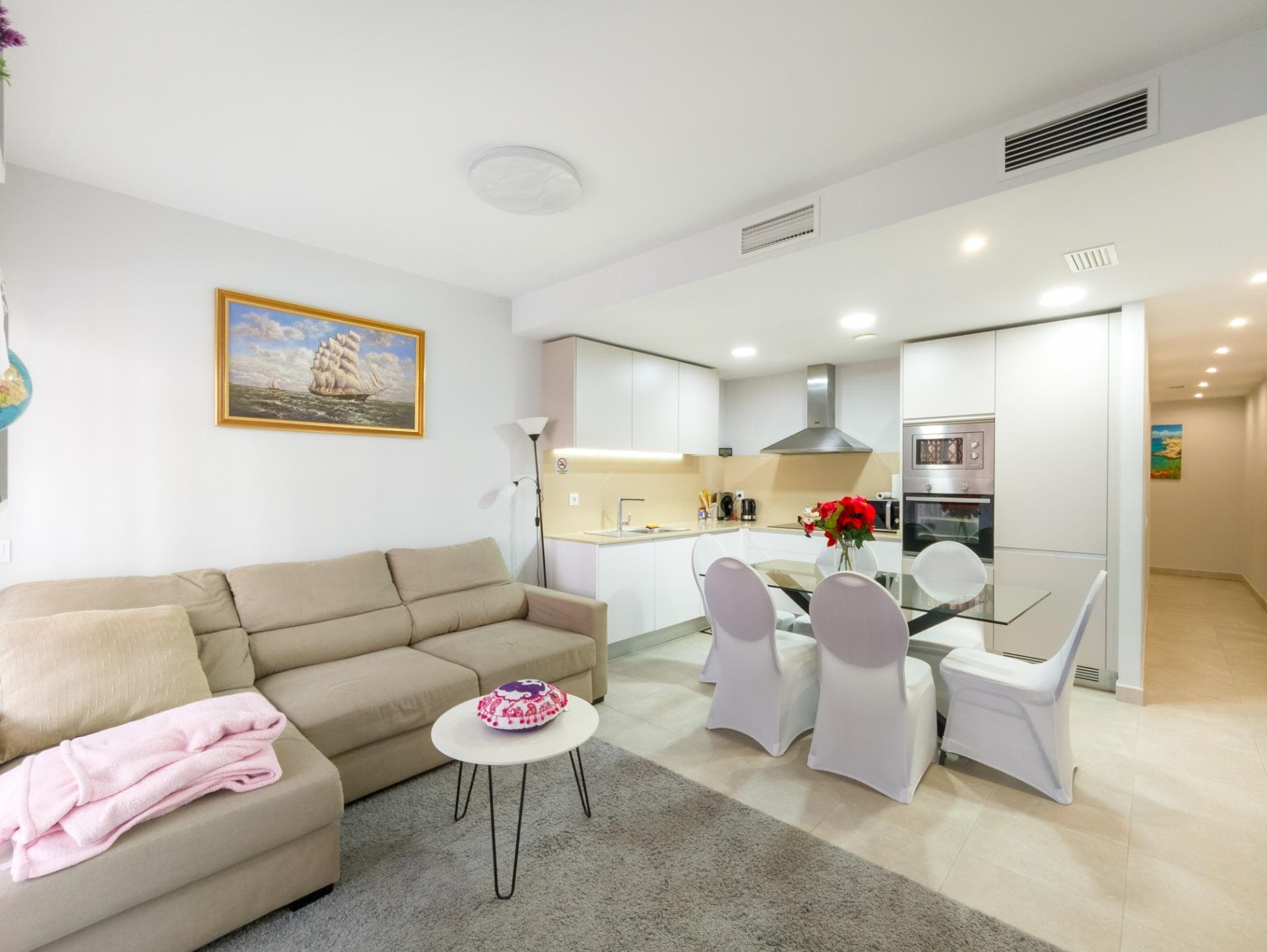 We present this modern apartment located in the center of Torrevieja, one of the most in-demand areas of the Costa Blanca. An ideal location to enjoy the Mediterranean climate, peace and quiet, and an active lifestyle all year round. The property stands out for its excellent layout and great natural light. It features a spacious living room with an open-plan kitchen and dining area, creating a modern and functional space. It also has a glazed terrace that brings in plenty of natural light, as well as a private storage room offering very useful extra space. The property offers 2 bedrooms and 2 full bathrooms, designed for comfort and practicality. It includes a garage parking space, providing security and convenience for your vehicle. Prime central location in Torrevieja, just 300 m from Playa del Cura and a short walk from the promenade. Surrounded by all services, restaurants, and leisure areas, with excellent connections. A lively area all year round, ideal both for permanent residence and investment. Everything is within a 5–10 minute walk. Torrevieja is a coastal city in constant growth, highly sought after both for holidays and long-term stays. In recent years, it has significantly improved its infrastructure, with new schools, sports facilities, and extensive residential developments. Its Mediterranean climate allows for year-round beach tourism. The property price does not include notary fees, registry fees, or applicable taxes, which may vary depending on the property price and current regulations in the Valencian Community.