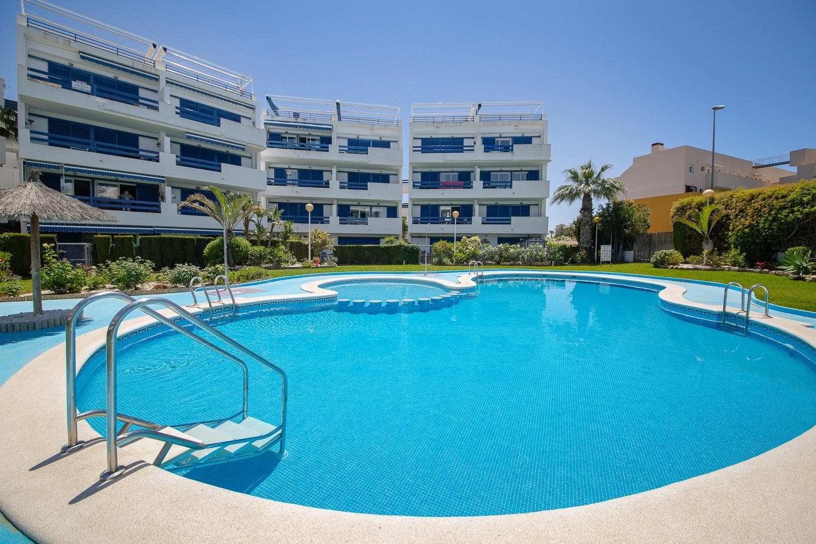 Discover this fantastic 112 m² ground floor apartment, located in the quiet and well-maintained Las Terrazas residential complex in Orihuela Costa. It's ideal as a permanent residence, a second home, or an investment property. The property stands out for its spaciousness, natural light, and excellent connection between the interior and exterior. It features a large living-dining room with an open-plan kitchen, a comfortable and functional space with direct access to the outside, providing abundant natural light throughout the day. It has two double bedrooms and two full bathrooms, offering comfort for families and guests alike. One of the highlights of this property is its magnificent 56 m² private garden, perfect for enjoying the Mediterranean climate, hosting al fresco meals, or creating your own chill-out space. In addition, the apartment includes a separate laundry room, adding extra functionality. Located within a well-maintained private residential complex with a communal pool and green areas, this property is ideal for relaxing and enjoying the surroundings. Main features: Ground floor 112 m² living space 2 bedrooms 2 full bathrooms Spacious living-dining room with open-plan kitchen Private garden of 56 m² Separate laundry room Common complex with communal pool and landscaped gardens Property tax (IBI): €176/year It is sold partially furnished. PARKING INCLUDED Located in Orihuela Costa, one of the most sought-after areas of the Costa Blanca, close to beaches, golf courses, shopping centers, restaurants, and all amenities. A perfect home for those seeking outdoor space, tranquility, and a high quality of life near the sea.