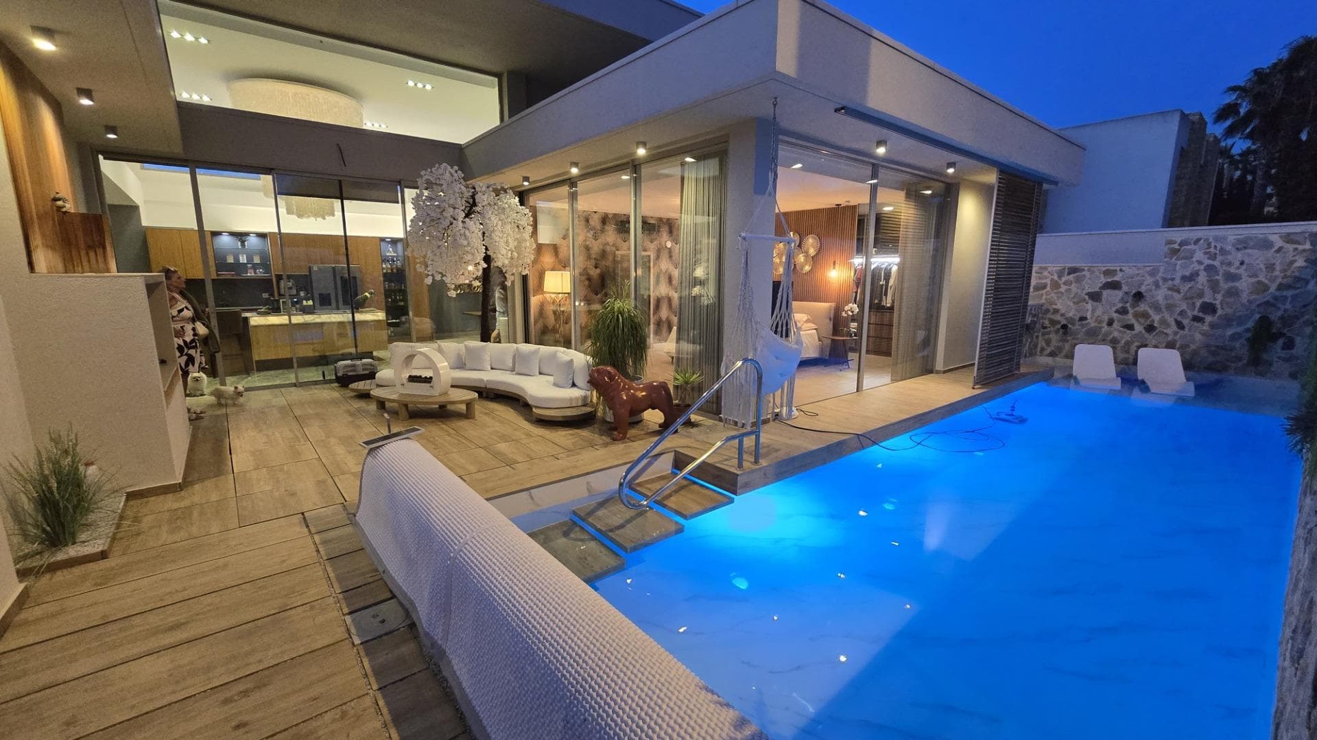 Exceptional Eco-Luxury Villa in Benijófar — A Masterpiece of Design, Wellness & SustainabilitySet in the desirable Residencial area of Benijófar, this remarkable villa stands as one of the most impressive eco-residences on the Costa Blanca. Designed and constructed with uncompromising attention to quality, comfort and efficiency, the property brings together world-class materials, advanced technology and elegant contemporary architecture to deliver a truly premium lifestyle experience. This is more than a luxury villa — it is an intelligently engineered sanctuary created for healthy living, wellbeing and absolute privacy. 🌿 A True Eco-House Built to the Highest Standard Every element of this villa has been designed with sustainability and performance in mind: The property is fully powered by solar energy, dramatically reducing running costs while ensuring environmentally responsible living. A state-of-the-art filtration and purification system delivers clean, healthy air and water throughout the entire home — enhancing comfort and wellness. Premium-grade materials, insulation, and construction methods ensure long-term durability, noise reduction and exceptional energy efficiency. Climate-control systems provide optimal comfort year-round, making the home efficient, quiet and exceptionally pleasant to live in. This is a home built for the future — eco-friendly, low-maintenance, and engineered for outstanding performance. 🏡 Generous Interiors, Separate Quarters & Versatile Professional Spaces The villa offers a spacious, flexible layout perfectly suited for luxury living, entertaining, and even running a business from home. Highlights include: Large, elegantly designed living areas with abundant natural light and premium finishes throughout. A fully independent guest apartment / separate quarters, ideal for visitors, extended family, staff, or private rental use. A dedicated business office, allowing you to work privately and professionally from home. A bespoke pedicure / podology room, perfect for running a small wellness service, personal use, or transforming into another treatment or beauty space. Multiple bedrooms and beautifully finished bathrooms offering comfort, privacy and refined style. Whether used as a luxury residence, a home-business combination, or a wellness retreat, the house adapts effortlessly. 💎 Unmatched Wellness & Resort-Style Amenities The villa has been designed to offer an unparalleled wellness experience: A heated private pool, ideal for year-round swimming and relaxation. Jacuzzis, whirlpool baths and spa-quality features throughout, including a steam-style shower environment for complete rejuvenation. Beautifully landscaped outdoor areas with sun terraces, shaded seating, and elegant spaces for entertaining and enjoying the Mediterranean climate. Everything is designed to elevate your daily lifestyle — comfort, relaxation, privacy and wellbeing all in perfect harmony. ✨ A Rare Opportunity in One of the Costa Blanca’s Most Desirable Areas This villa effortlessly blends sustainable design, elite construction, luxury amenities and versatile living spaces. Its combination of solar-powered efficiency, wellness features, independent guest quarters and business-ready rooms makes it a truly unique property — ideal for those seeking a residence that offers far more than a place to live. With its premium location, advanced eco-systems and exemplary craftsmanship, this home stands as one of the finest offerings currently available in Benijófar.