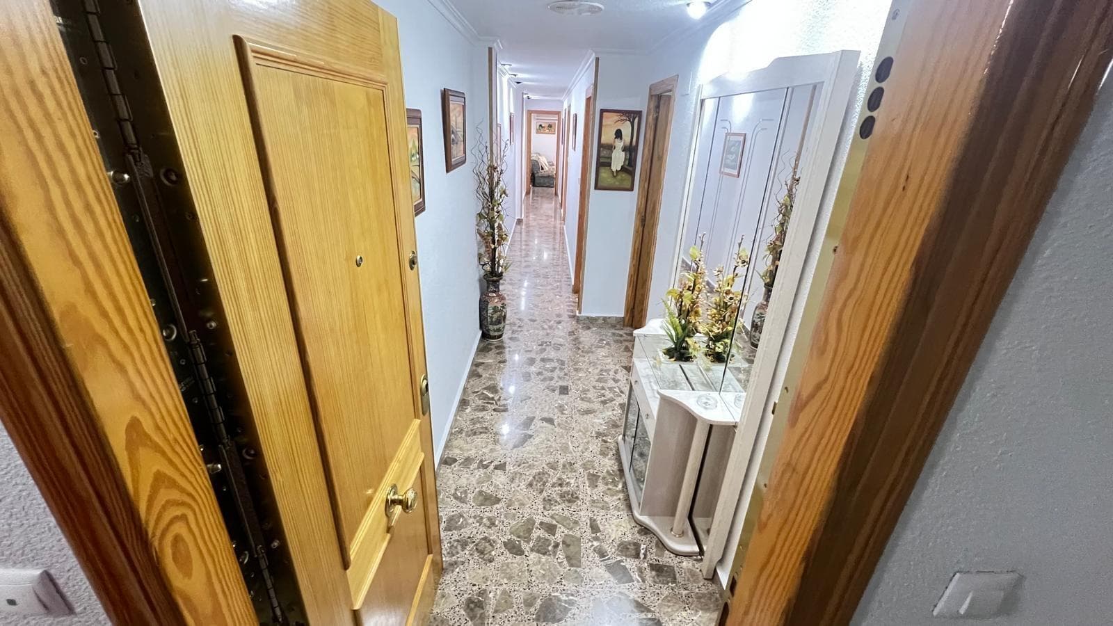 ✨ MODERN CHARMING APARTMENT JUST 500 METERS FROM THE BEACH – TORREVIEJA 🌊 Looking for a home with personality, close to the sea and surrounded by amenities? This third-floor apartment, located in a central area of ​​Torrevieja, offers the perfect combination of modern style, functionality, and a prime location. 📐 80 m² of well-used space, with a layout designed to enjoy every space. From the moment you enter, you'll notice unique details and exotic touches that give the home its own identity, ideal for those looking for something different and cozy. 🏡 Main features: 2 bedrooms: a very bright double and a single, perfect as an extra bedroom or workspace. Both have adjustable lighting systems to adapt the atmosphere to suit the needs of the moment. Fully equipped bathroom with modern and functional finishes. Fully equipped kitchen with integrated laundry area, comfortable and practical. A spacious and bright living room, perfect for relaxing or entertaining, with direct access to a pleasant terrace where you can enjoy the Mediterranean climate. Marble floors provide elegance and freshness. Central air conditioning maintains an ideal temperature year-round. 🎵 Integrated sound system throughout the home, so you can enjoy your favorite music in every corner. 📍 Excellent location: Just 500 meters from the beach, and with all services within easy reach: supermarkets, public transportation, restaurants, shops, pharmacies, schools... everything you need for a comfortable life without sacrificing the coastal setting! 💡 This apartment is ideal as a permanent residence, a second home, or a vacation rental investment. A space full of character, ready to move in and enjoy from day one. 📲 Can you imagine living here? Contact us for more information or to schedule your visit. Your new home on the coast is waiting for you!