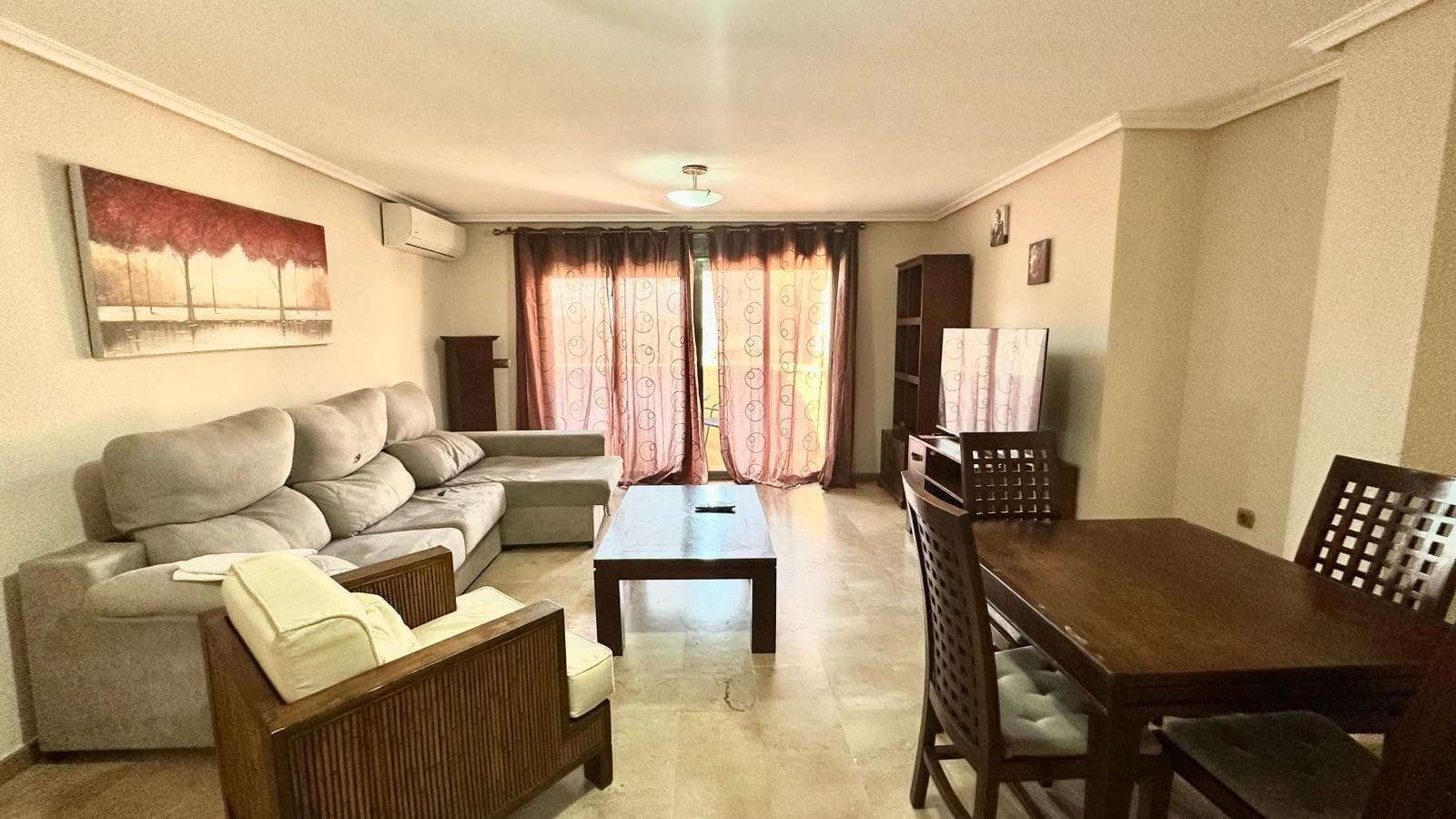 Spacious 3-Bedroom Apartment with Terrace and Andalusian Patio – First Floor in Torrevieja We present this spacious first-floor apartment, ideal for those seeking comfort, spaciousness, and an excellent location in Torrevieja, without having to climb stairs. The home has 123 m², perfectly distributed to offer functionality and comfort in every room. It has three bedrooms, two of them single, perfect as secondary bedrooms, an office, or a guest area, and a spacious master bedroom suite with its own private bathroom, providing extra privacy and comfort. The master bedroom also has air conditioning, ensuring a pleasant atmosphere year-round. The apartment also has a second full bathroom, making it an ideal option for families and those seeking extra space for visitors or guests. The kitchen is separate, allowing for comfortable cooking without intruding on the seating or meeting areas. It features a gallery and direct access to a charming Andalusian patio, a private outdoor space perfect for creating a relaxation corner, planting plants, enjoying al fresco meals, or simply unwinding. The living-dining room is spacious and bright, with direct access to the north-facing terrace, ideal for enjoying a cool and pleasant outdoor space at any time of year. Main features: ✔️ 123 m² built area ✔️ 3 bedrooms (2 singles + 1 double suite) ✔️ 2 full bathrooms ✔️ Separate kitchen with utility room and access to an Andalusian patio ✔️ Air conditioning in the master bedroom ✔️ Living-dining room with access to a terrace ✔️ North-facing terrace ✔️ First floor with elevator Located in a well-connected area, close to all amenities: supermarkets, schools, pharmacies, public transportation, and just minutes from the beaches and downtown Torrevieja. An excellent opportunity for those looking for space, comfort, and a special touch like the Andalusian patio, in one of the most sought-after areas of the city. Want more information or to visit? Contact us without obligation.