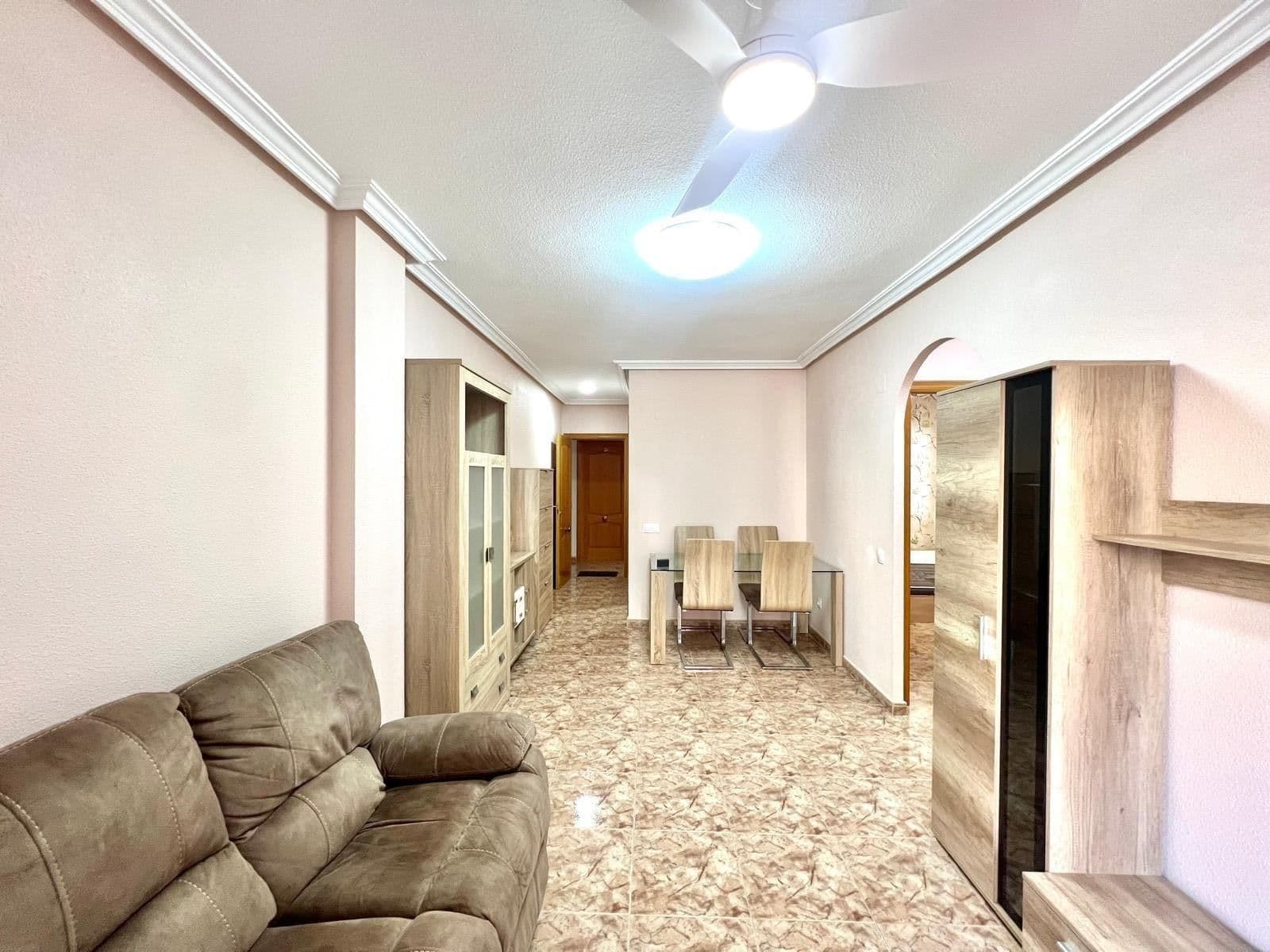 Apartment for rent 700 metres from the beach – Torrevieja centre We present this cosy apartment located in the heart of Torrevieja, just 700 metres from the beach and a few minutes' walk from the bus station, making it a perfect choice for both permanent residence and comfortable holiday stays. The property is located on the third floor of a well-maintained building with easy access. Its layout is practical and functional, offering well-utilised spaces and excellent natural lighting. It has two spacious bedrooms, ideal for rest and comfort, as well as a fully equipped bathroom with a shower, renovated and designed for everyday convenience. The kitchen is separate, allowing you to cook without disturbing the other rooms, and has everything you need for everyday use. The spacious and bright living-dining room opens directly onto a north-facing terrace, perfect for enjoying a cool and pleasant atmosphere, especially in the warmer months of the year. Thanks to its excellent location, the flat is surrounded by all essential services: supermarkets, restaurants, shops, leisure areas and public transport, offering maximum convenience without the need for a vehicle. In short, a comfortable, functional and well-located home, ideal for those looking to live close to the sea and the city centre, with all services within easy reach.