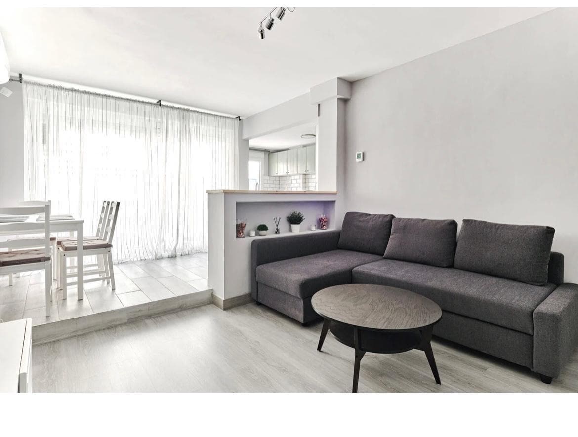 A magnificent opportunity arises to acquire an elegant apartment located just 200 meters from the renowned Playa del Cura beach, in the heart of Torrevieja. This prime location allows you to enjoy immediate proximity to the sea, combined with the convenience of having all essential services within walking distance, making this property an ideal option for a primary residence, a second home, or a real estate investment. The property stands out for having been completely renovated, presenting an impeccable condition and adapted to current demands in terms of comfort, design, and functionality. The comprehensive renovation has modernized all the spaces, optimizing the interior layout and improving both the aesthetics and the quality of the finishes, resulting in a home ready to move into without the need for any further work. The apartment has two bedrooms, both designed to offer a welcoming, practical, and well-lit atmosphere. These rooms are of adequate size, allowing for comfortable furniture arrangement, guaranteeing both privacy and rest. Their versatility allows them to be adapted to different uses, whether as master bedrooms, guest rooms, or even workspaces. The property also features two full bathrooms, a highly valued element that provides a high level of comfort in daily life. Both spaces have been renovated with a modern approach, incorporating contemporary materials and functional solutions that promote durability and efficient use. One of the most remarkable aspects of the property is its east-facing orientation, which allows for excellent natural light during the early hours of the day. This characteristic brings brightness and freshness to the home, creating a pleasant and balanced atmosphere, especially in the main living areas. The orientation is also ideal for those who appreciate well-lit spaces without direct exposure to the intense afternoon heat. The proximity to Playa del Cura is undoubtedly one of the main attractions of this apartment. The possibility of accessing the sea in just a few minutes' walk adds significant value, allowing you to enjoy the Mediterranean lifestyle to the fullest. Strolls along the seafront, outdoor activities, and the wide range of restaurants and leisure options in the area are all part of daily life in this privileged setting. Furthermore, the property is surrounded by a complete range of amenities, including supermarkets, shops, restaurants, pharmacies, medical centers, and public transport, ensuring a comfortable and convenient lifestyle without the need for long commutes. Overall, this apartment boasts an exceptional combination of location, high-quality renovations, functional layout, and favorable orientation. Its proximity to the sea, along with its impeccable condition and features, positions it as a highly competitive option within the local real estate market. In short, this property offers comfort, style, and an excellent quality of life, ideal for those seeking to enjoy the coast in a central and well-connected setting, or for those looking to make a secure investment with high potential returns.