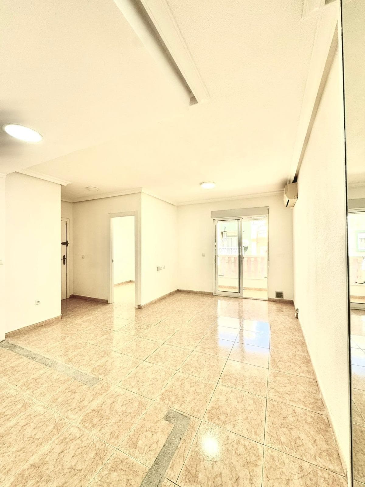 This is an excellent opportunity to purchase an elegant, fully renovated property situated just 450 metres from the renowned Playa del Cura, one of the most sought-after and highly regarded areas of Torrevieja. This property combines a prime location, a meticulous full refurbishment and a modern design, making it an ideal choice as a primary residence, a second home or a property investment. The property features a bedroom, designed to offer a cosy, bright and functional atmosphere. Thanks to the home’s optimised layout, the bedroom provides a pleasant sense of space and comfort, making it an ideal space for rest and privacy. Its modern design and the finishes used reflect the care and attention paid to every detail of the refurbishment. The property also features a fully renovated en-suite bathroom, finished with contemporary materials and functional solutions that provide comfort and a modern aesthetic. The comprehensive refurbishment of this room has created an elegant, practical space that blends seamlessly with the modern style of the rest of the home. One of the standout features of this property is that it has been completely refurbished, with both the finishes and the essential elements of the home having been updated. The result is a modern, attractive property ready to move into, offering a fresh, contemporary look that far exceeds the usual features of similar homes in the area. The property faces east, a feature particularly appreciated by those seeking to enjoy excellent natural light during the early hours of the day. This orientation brings brightness, freshness and a particularly pleasant atmosphere inside the property, fostering a warm and comfortable ambience all year round. Currently, the only work remaining is the installation of the kitchen, which also represents an additional advantage for the future owner, as it offers the chance to customise this space entirely to their taste and needs. This allows the design, layout and fittings of the kitchen to be adapted to personal preferences, providing added value in terms of personalisation and functionality. The property’s location is another of its major attractions. Situated just 450 metres from Playa del Cura, it allows you to enjoy the sea and the promenade within a few minutes’ walk, fully integrating the Mediterranean lifestyle into daily life. The proximity to the beach, combined with the dynamic and established atmosphere of the area, makes this property a highly attractive option both for living in and for generating income through holiday or residential rentals. Furthermore, the property is surrounded by all essential amenities, including supermarkets, restaurants, cafés, pharmacies, medical centres, shops and public transport, offering exceptional convenience without the need for long journeys. Overall, this property represents a unique opportunity for those seeking a modern, fully refurbished flat situated close to the sea. The quality of the refurbishment, its favourable orientation and its excellent location make this property a highly competitive option within the current property market. In short, this is a visually and functionally appealing flat, designed to allow you to enjoy the comfort, light and quality of life offered by the Mediterranean coast in one of the most sought-after areas of Torrevieja.