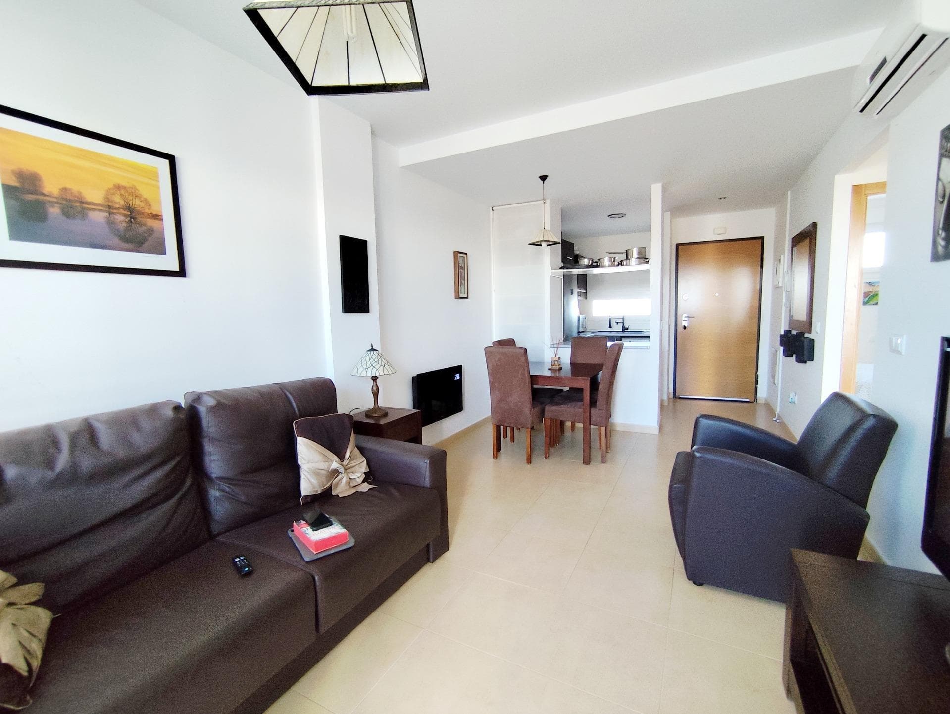 Key ready penthouse apartment on the 3rd floor Lovely partment with amazing views! Communal swimmingpools and landscaped gardens. Parking place in front of the building. Living room with acces to the terrace. Open kitchen with appliances and new oven, hub, sink and tab 2 bedrooms with build in wardrobes, family bathroom with sliding door, sink, toilet, walk-in shower Airconditioning C/H and electric heating. Very neat and cozy apartment with views over the 9th hole. Lift Communal swimmingpools "Located in the charming municipality of Torre-Pacheco, near the town of Roldán, this complex enjoys a strategic location in the heart of the Murcia region. Enjoy all the riches and activities that this sunny region has to offer. With direct access to the RM-19, you will reach the main points of interest in the area in less than 20 minutes, beaches, shops, cultural and sports infrastructures etc The complex offers an idyllic and tranquil living environment, perfect for relaxing throughout the year.  Among the services available are: 24/7 security, parks, children's play areas, exclusive swimming pools for residents, a supermarket and privileged access to one of the most renowned golf courses in the region.