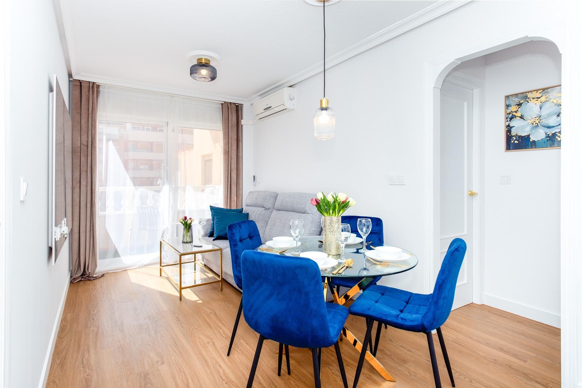 Discover this beautiful, completely renovated ready-to-move-in apartment located in the heart of Torrevieja, just a 10-minute walk (approx. 700 m) to the beach and marina. Shops, restaurants, cafés, bus stops, and all essential services are only a few meters away, making everyday life very convenient. The apartment is located in a well-maintained building with clean common areas and an elevator. There is also an underground parking garage in the building, with the possibility of acquiring a parking space (subject to availability). The apartment is very bright and sunny, with a functional layout, featuring a lovely south-west facing terrace with open, unobstructed views - something truly rare in an urban setting - where you can fully enjoy the Mediterranean sun. All windows are exterior, ensuring plenty of natural light and good ventilation throughout the home. It is tastefully furnished in a modern style with brand-new appliances, making it ideal for year-round living, a holiday home, or as a rental investment. Highlights: - Fully renovated - brand new condition - Bright and sunny with south-west orientation - All windows are exterior - Stylish, modern interior with new furniture and appliances - Fully equipped, modern kitchen - Bathroom with walk-in shower - Comfortable vinyl flooring throughout - Smooth finished walls - Upgraded electrical system (5.75 kW with official certificate) - Air conditioning and ceiling fans - Videophone system - Plenty of storage and built-in cabinets Don’t miss this opportunity — get in touch to arrange a viewing or for more information. The indicated final price does not include taxes (ITP/VAT/ IVA) nor notary and registry expenses, which will be calculated according to the current tariffs and rates.