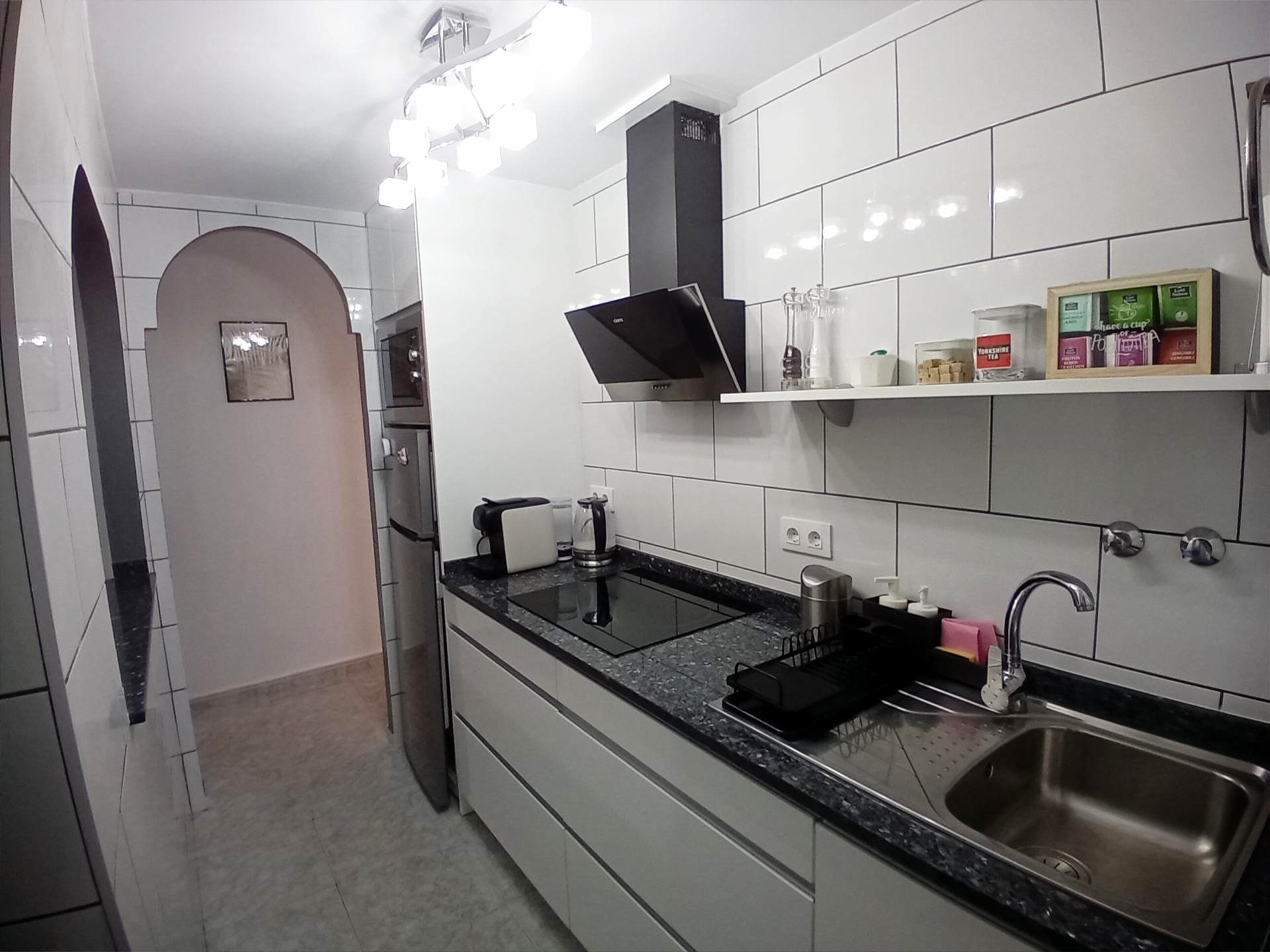 2 bed, 1 bath Apartment For Sale in Puerto De Mazarrón, Murcia. Complete with it's own underground garage Business or Pleasure – Beachfront Bliss Just 50m from the Shore. Your guests will love it! Whether you're looking for a high-performing holiday let or a dreamy coastal escape, this frontline apartment delivers on every front. Located just 50 metres from the golden sands, this beautifully renovated 2-bed, 1-bath gem is currently rated Best in the Area on Booking.com with an impressive 9.7 score — and it’s easy to see why.  Renovated to a high-end finish at the end of 2023, this turnkey property is sold fully furnished with sleek kitchen appliances and stylish décor — just walk in, sit down, or step out to the beach. The bright, open-plan lounge and kitchen flow seamlessly onto two private terraces, with a sunny communal roof terrace offering even more space to unwind and take in the sea breeze. Added bonus? A rare underground garage is included in the price — say goodbye to the summer parking struggle. The garage comes with its own separate deed, you can choose to rent it out for extra income or keep it for personal use. A complete package waiting for you! With solid rental income, (average 120€ per night and 11 months booked up a year) Glowing guest reviews, and prime beachside positioning, this apartment is the perfect balance of business and pleasure!!!