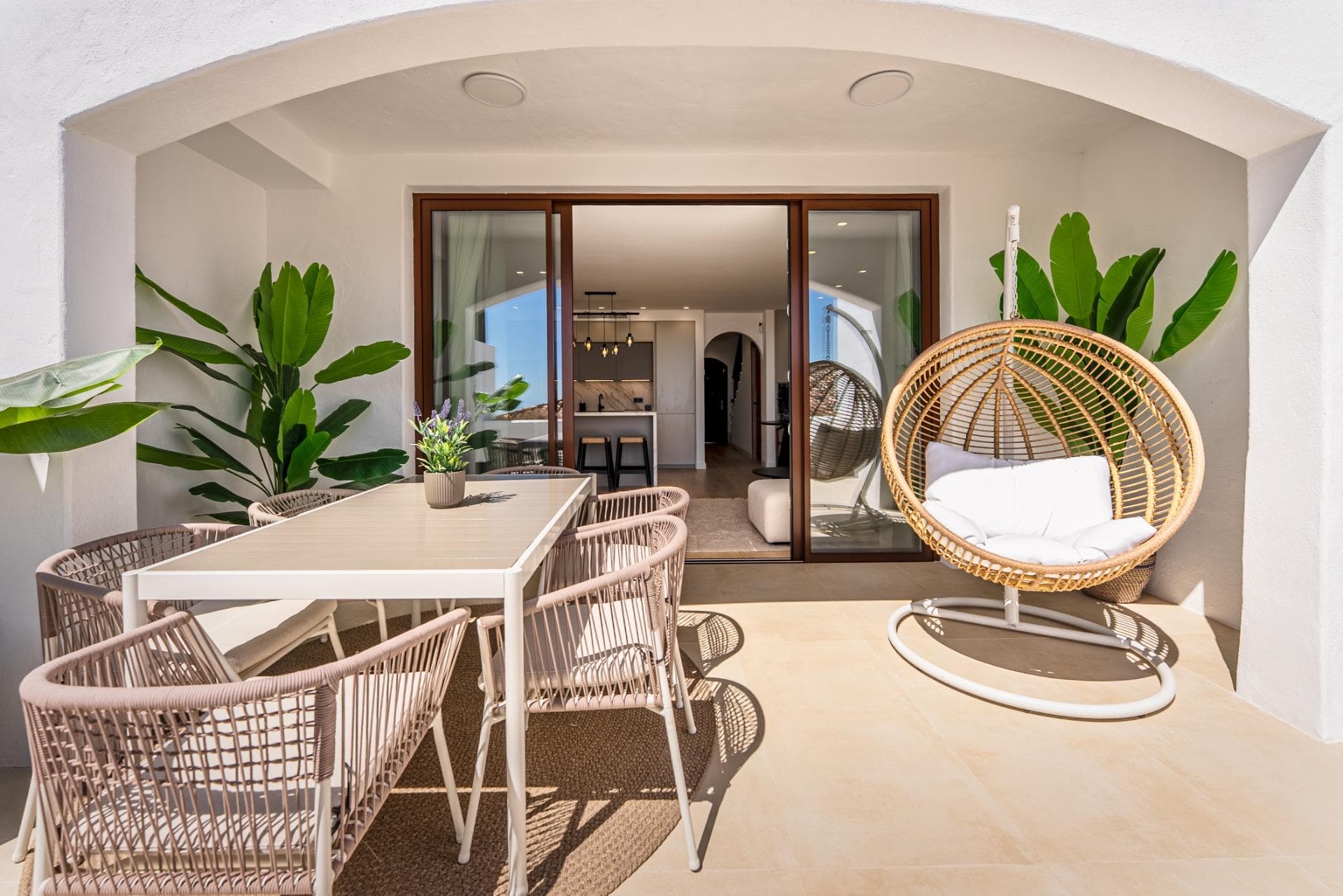 Welcome to this exceptional 3-bedroom, 3-bathroom townhouse, perfectly positioned in the prestigious urbanisation of El Alto, within the renowned Los Arqueros Golf & Country Club. Recently refurbished to the highest standard, this home offers a rare combination of traditional Andalusian charm and sleek modern design, creating a residence that feels both timeless and contemporary. The property has been thoughtfully redesigned to maximize light, space, and comfort. The heart of the home is the open-plan kitchen and living area, where modern finishes and high-quality fittings blend seamlessly with warm Spanish character. Expansive floor-to-ceiling glass doors open directly onto the terrace, allowing natural sunlight to flood the interior while framing the spectacular views beyond. This perfect indoor-outdoor flow makes the space ideal for entertaining, family gatherings, or simply enjoying the peaceful surroundings. The south-facing orientation ensures that the home is bathed in sunshine throughout the day, while the large terrace offers uninterrupted panoramic vistas stretching across Marbella and Estepona, all the way to the iconic Rock of Gibraltar. From sunrise to sunset, residents can enjoy breathtaking sea and mountain views — a rare feature further enhanced by the fact that the surrounding land is protected from development, ensuring complete privacy and uninterrupted scenery for years to come. The townhouse features three generously sized bedrooms, each designed with comfort in mind, as well as three stylish bathrooms with modern finishes. The master suite benefits from its own private terrace, offering a tranquil retreat with even more impressive views. Ample storage, a functional layout, and carefully chosen details throughout the property make it not only beautiful but also practical for year-round living or as a luxurious holiday home. Beyond the home itself, residents of El Alto enjoy access to beautifully maintained communal gardens and two large swimming pools — perfect for cooling off during the warm Costa del Sol summers. The property is located within walking distance of the prestigious Los Arqueros Golf Club, designed by the legendary Severiano Ballesteros. In addition, the area offers a variety of amenities including a bowling alley, gym, and several excellent restaurants, all just a short stroll away. Perfectly situated between Marbella and Estepona, and only a short drive from the glamorous Puerto Banús, this home combines the best of convenience and exclusivity. Whether you are a golf enthusiast, a lover of Mediterranean views, or someone seeking a peaceful home with easy access to vibrant coastal life, this townhouse offers an unparalleled lifestyle opportunity.