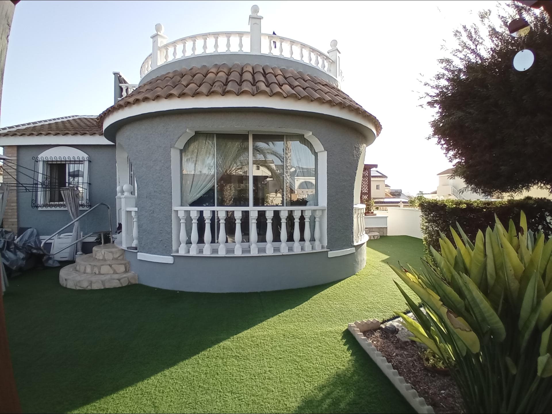 Just a five-minute stroll from the golf course and clubhouse, this three-bedroom, three-bathroom villa on sought-after Camposol Sector C (Lower) offers space, flexibility, and a world of potential. Whether you’re a savvy developer, investor, or modern homeowner looking for something special, this property ticks all the right boxes. Step inside and you’ll find a bright, generously sized home with comfortable living areas and bedrooms designed for easy, modern living. But it’s what lies beneath that truly sets this property apart: a massive underbuild, large enough to swing a giraffe and create an independent 2–3 bed apartment, a cinema and games room plus bar, or your own gym and wellness retreat with ample yoga space! The options are endless. And while this villa doesn’t yet have a pool, that’s a bonus. It’s your blank canvas to design a bespoke outdoor sanctuary—perhaps a sleek stone pool surrounded by mature palms, olive and citrus trees, and tropical birds of paradise. The established garden already offers terraced raised beds for growing fruit and vegetables, a wood store, and a hidden underground workshop/laundry room, blending practicality with charm. The location seals the deal. Just a three-minute drive (or an easy walk) brings you to the local commercial centre with everything at your fingertips—supermarket, medical centre, beauty salons, opticians, vets, petrol station, plus an array of bars and restaurants. Fancy a day at the beach? The stunning coastline of Bolnuevo and Puerto de Mazarrón is only 15 minutes away. For travel and adventure, you’re close to RMU International Airport (30 mins), the historic city of Cartagena (40 mins), and the culinary capital of Murcia (under an hour). Even Sierra Espuña’s ski slopes and Madrid are within easy reach for weekend getaways. This villa is more than just a home—it’s an opportunity. With its prime location, huge underbuild potential, and scope for a designer pool and garden, it’s a smart buy for anyone with vision. Modern lifestyle. Classic Spanish setting. Limitless potential. Additional box ticking goes like this: Solar panels Air conditioning Off street parking Existing Carp pond or space for Pool.