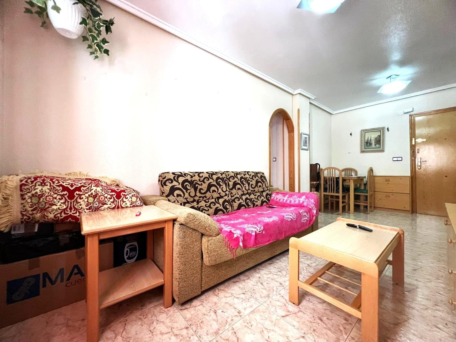 2 bedroom apartment only 250m from the beach in Guardamar del Segura  PROPERTY: As soon as we enter the property, we are greeted by a large living space with a fully functional kitchen. There are two bedrooms on the home with windows on the outside. One completely remodeled bathroom with a shower screen is available. Spanish Mediterranean tiles adorn the property's enclosed terrace. The property has an elevator and is on the first floor. LOCATION: Guardamar del Segura is a charming coastal town located in the province of Alicante, within the Valencian Community. Known for its extensive fine sandy beaches and natural surroundings, it is an ideal destination for those seeking sun, sea, and tranquility. Guardamar has more than 11 kilometers of beaches, some of which have been awarded the Blue Flag for their quality and services, such as Ortigues-Campo beach, which received this distinction for the first time in 2025. Furthermore, it is notable for its dune and pine forest park, the result of an ambitious reforestation project initiated at the end of the 19th century to stop the dunes from advancing toward the urban center. This area offers hiking and cycling trails, allowing visitors to enjoy nature in all its splendor. Additionally, there are numerous cafes, bars, and restaurants nearby. A playground and a lovely park are nearby. DISTANCE TO THE BEACH:250m IBI:157 EUROS COMMUNITY FEES: 22 euros per month