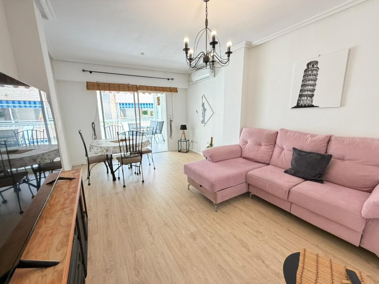 Refurbished 2-bedroom flat 50 metres from PLAYA DEL CURA beach in Torrevieja Just 50 metres from Playa del Cura beach, you will find this charming flat that combines the convenience of a privileged location with the comfort of a comprehensive and modern renovation. Located on the third floor, the flat has been completely renovated and equipped, ready to move into or start renting out from day one, with the possibility of obtaining a tourist licence. The flat has two bedrooms, whose windows overlook the courtyard, ensuring peace and quiet, as well as a full bathroom and an additional toilet, perfect for added convenience. The open-plan kitchen is integrated with the living room, creating a spacious, bright and functional space, ideal for sharing moments with family or friends. One of the great attractions of the property is its 10 m² terrace, from which you can enjoy sea views, feel the sea breeze and experience the essence of the Mediterranean up close. The property also includes a parking space, an added value in one of the most sought-after areas of Torrevieja.  LOCATION: Torrevieja is in the province of Alicante (Costa Blanca). It is famous for its Mediterranean climate and its coast. We cannot forget its promenades where we can find some restaurants along the fine sandy beaches. It also has many excellent beaches such as Playa de los Náufragos, Playa de los Locos and Playa de la Mata. Therefore, it is considered a remarkable tourist town where the environment takes an important place as an important tourist attraction. In addition, we can find many shopping centres (Habaneras, La Zenia Boulevard), golf courses, sport centres, hospitals (such as Hospital Universitario de Torrevieja) and airports such as Alicante Airport (35 km away) and Region of Murcia International Airport (43 km away). DISTANCE TO THE SEA: 50m COMUNITY: 570 €. IBI: 275 €. Should you have any question do not hesitate to contact us!