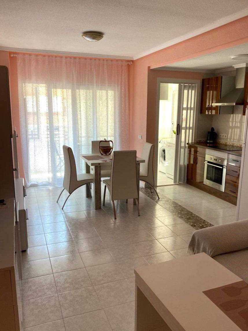 Cozy one-bedroom apartment with a terrace and pool in Torrevieja Located on the third floor with elevator access, the apartment features a well-designed layout and a pleasant sense of natural light throughout the day. The living room opens onto a private terrace, perfect for enjoying the sunny weather, having breakfast outdoors, or unwinding at the end of the day. The kitchen and living areas have been designed to make the most of every square foot, creating a practical and comfortable atmosphere. In addition, the property features a separate laundry area, a bonus that adds convenience to daily life. It is part of a residential complex with a communal pool, ideal for cooling off during the warmer months and enjoying leisure time without leaving home. LOCATION: Torrevieja is in the province of Alicante (Costa Blanca). It is famous for its Mediterranean climate and its coast. We cannot forget its promenades where we can find some restaurants along the fine sandy beaches. It also has many excellent beaches such as Playa de los Náufragos, Playa de los Locos and Playa de la Mata. Therefore, it is considered a remarkable tourist town where the environment takes an important place as an important tourist attraction. In addition, we can find many shopping centres (Habaneras, La Zenia Boulevard), golf courses, sport centres, hospitals (such as Hospital Universitario de Torrevieja) and airports such as Alicante Airport (35 km away) and Region of Murcia International Airport (43 km away). DISTANCE TO THE SEA: 1000m COMUNITY: 360 €. IBI: 180 €. Should you have any question do not hesitate to contact us!