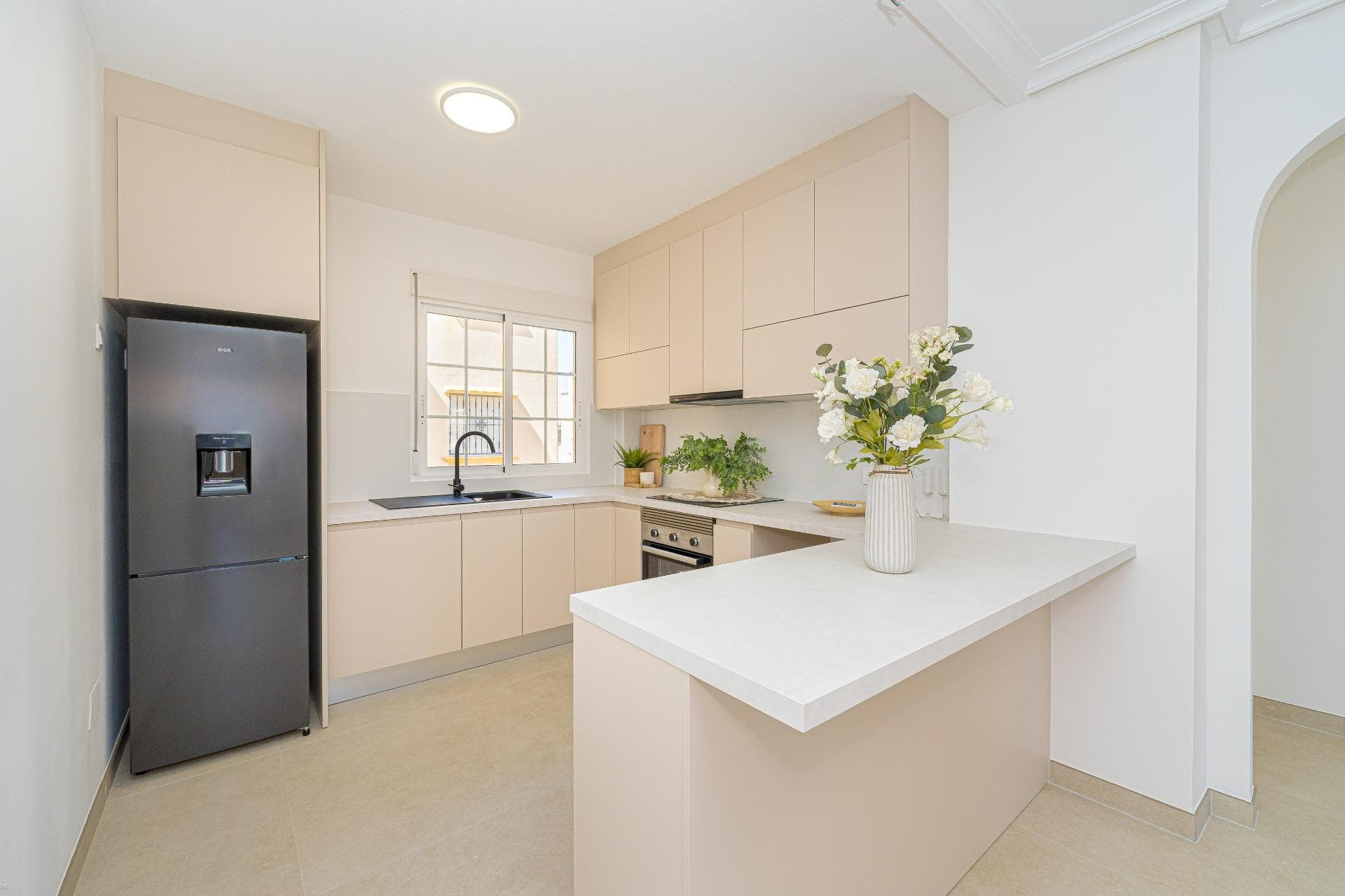 Discover a remarkable opportunity to own a beautifully renovated apartment that combines modern living in a traditional setting. This stunning first-floor apartment showcases the perfect blend of style and functionality. The living space is bathed in natural light and flows perfectly into the brand new kitchen with breakfast bar waiting to prepare delicious meals. The property comprises of 2 bedrooms, each including fitted wardrobes and 1 fully renovated bathroom with walk-in shower. The cabinet includes draws and a mirror with LED backlight and anti-condensation function. The golden finishes make this stunning bathroom really stand out. The kitchen comes with new white goods and a new electric waterheater.  The East facing balcony offers views of the surrounding areas and gives the opportunity for al-fresco dining and your morning coffee, making sure you enjoy the mediteranean climate tot he maximum. Conveniently located just 2.8 kilometers from stunning blue flag beaches, you'll have quick access to sun-soaked shores and refreshing sea breezes. The area is also just a short stroll away from supermarkets and essential amenities, ensuring that everything you need is within easy reach. Alicante airport is only 50 minutes away by car. The property will be sold unfurnished giving the new owners the opportunity to put their own stampo on it and make it a real home. Features: •Hot/cold aircon in living room and master bedroom •Brand new appliances •New kitchen •New bathrooms •New floor •New doors and frames •New sockets and plugs •Open distribution •LED spotlights •Freshly painted •New mechanism in shutters •New waterheater Dont miss this unique opportunity. Schedule a viewing today and step into your new dream apartment. In the last meeting of the community of owners they aproved the possibility to apply for a tourist licence of each property making this a great investment opportunity.