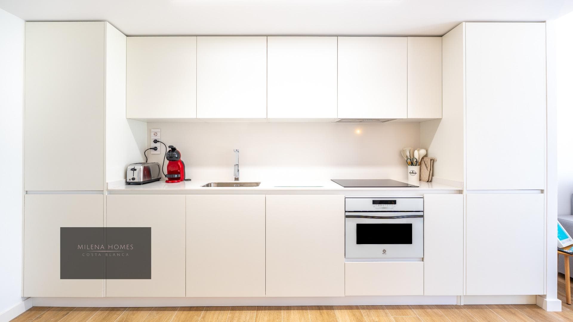 2 Bedrooms | 2 Bathrooms | Private Garden | South-Facing We present to you an apartment that captivates from the very first moment. Located on the ground floor of the prestigious Residencial Posidonia, this home combines modernity, privacy, and the charm of authentic Mediterranean style. Just a few steps from the sea, it is the perfect place for those who want to enjoy tranquility without sacrificing luxury. ✨ Ready to move in and enjoy The apartment is delivered fully furnished and equipped, so you only need to open the door and start feeling at home. Its practical design, large windows, and south-facing orientation fill every room with natural light, creating a warm, bright, and welcoming atmosphere throughout the year. It features: 2 double bedrooms, both with built-in wardrobes and direct access to the garden 2 full, elegant, and modern bathrooms with underfloor heating for superior comfort Fully equipped kitchen, modern and functional Spacious living-dining room, connected to the garden and perfect for family or social gatherings 🌿 A private garden to enjoy the outdoors all year round The standout feature of this property is its private garden — a versatile space full of possibilities: sunbathing, relaxing with a book, setting up a chill-out area, or hosting outdoor meals… A small oasis that makes this apartment the ideal choice for both year-round living and memorable vacations. ⭐ Details that make the difference Ducted air conditioning Electric blinds Solar-powered hot water system Energy certification C/B Accessibility for people with reduced mobility Additionally, it includes: Underground parking space Private storage room 🌊 Posidonia: One of the most exclusive residential complexes by the sea Living in Posidonia means enjoying unique facilities designed for your utmost well-being: Three communal swimming pools, including: Infinity pool with sea views Children’s pool Heated pool Outdoor Jacuzzi Impeccable landscaped areas Gated community with 24/7 security and video surveillance All of this in an exceptional location, just a short walk from the promenade, restaurants, supermarkets, medical centers, and all the necessary services for a comfortable and practical life. 💎 A home to live, enjoy, and also invest This apartment has it all: quality, location, design, and comfort. A perfect opportunity as a primary home, second residence, or investment with high returns on the Costa Blanca. ✨ A modern, secure home full of charm in one of the most sought-after complexes in Punta Prima. Don’t miss this opportunity! 📩 Contact us for more information or to arrange a viewing.