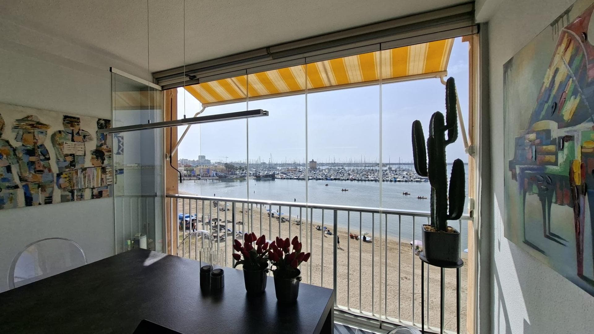 If you've always dreamed of waking up to the Mediterranean, this is your chance. Located right on the beachfront of Acequión, this apartment boasts panoramic views of the sea and the marina, visible from the living room, kitchen, and several areas of the home. A true gem by the sea. Situated on the third floor of a building with a lift, the apartment offers three bedrooms and two full bathrooms. The former terrace has been integrated into the living room, creating a spacious, bright environment enhanced by floor-to-ceiling windows that flood the space with natural light and offer uninterrupted sea views. The open-plan kitchen flows seamlessly into the living area and also faces the sea—so you can cook while enjoying the view. The property is sold fully furnished and equipped, with air conditioning, ready to move into. Surrounded by all amenities—supermarkets, restaurants, pharmacies, public transport—and just a short walk from Torrevieja’s city centre, this property combines comfort, convenience, and a premium location. A unique opportunity to live or holiday literally at the water’s edge on Spain’s Costa Blanca.